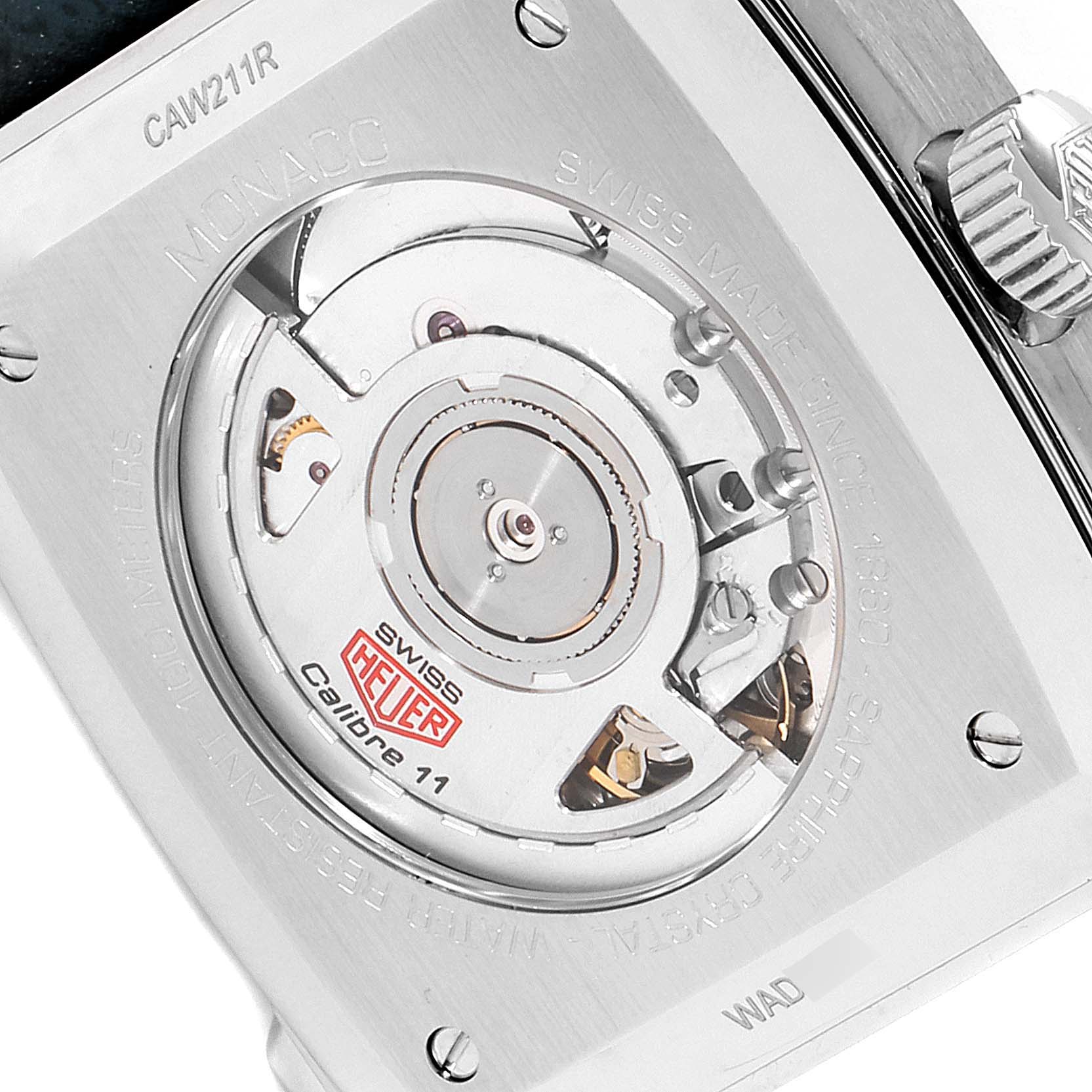 The image shows the back view of the Tag Heuer Monaco CAW211R.FC6401 Men's Stainless Steel Blue Dial CAW211R.FC6401 Men's Stainless Steel Blue Dial watch, highlighting its Calibre 11 movement and internal mechanisms.