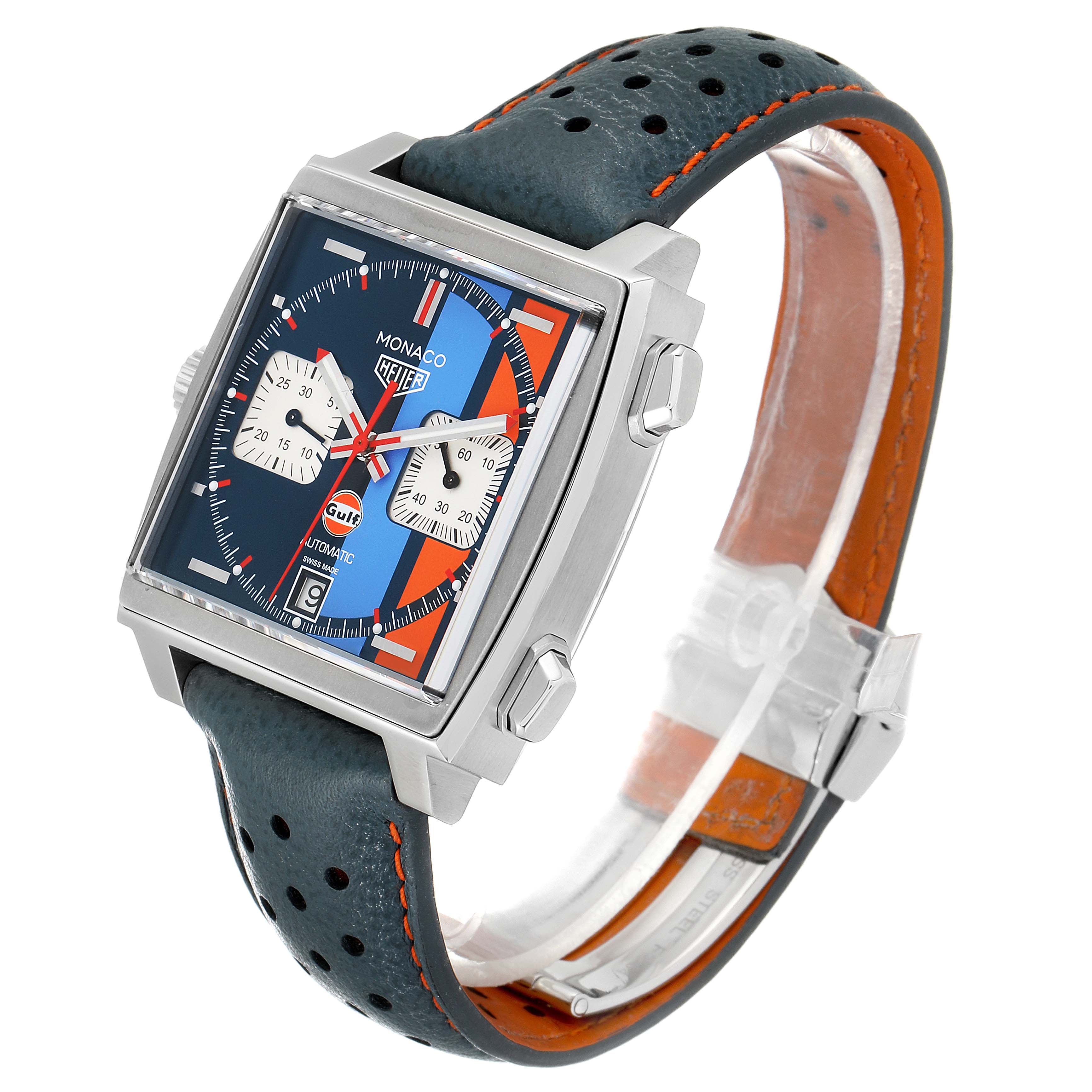 The Tag Heuer Monaco CAW211R.FC6401 Men's Stainless Steel Blue Dial CAW211R.FC6401 Men's Stainless Steel Blue Dial watch is shown at a slight angle, highlighting the square face, two subdials, and perforated leather strap.