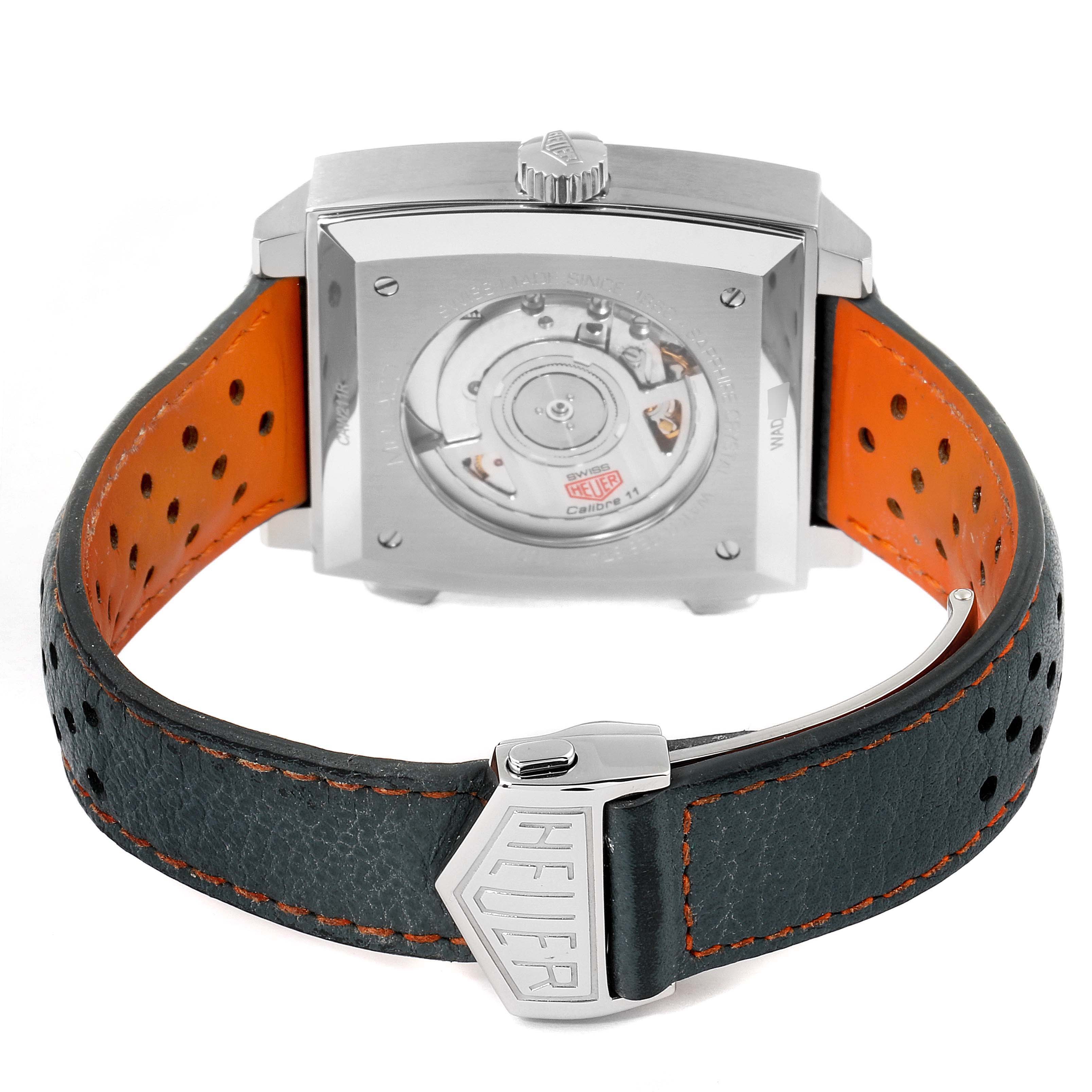 The image shows the back case and strap of the Tag Heuer Monaco CAW211R.FC6401 Men's Stainless Steel Blue Dial CAW211R.FC6401 Men's Stainless Steel Blue Dial watch, displaying the movement through a transparent case back.