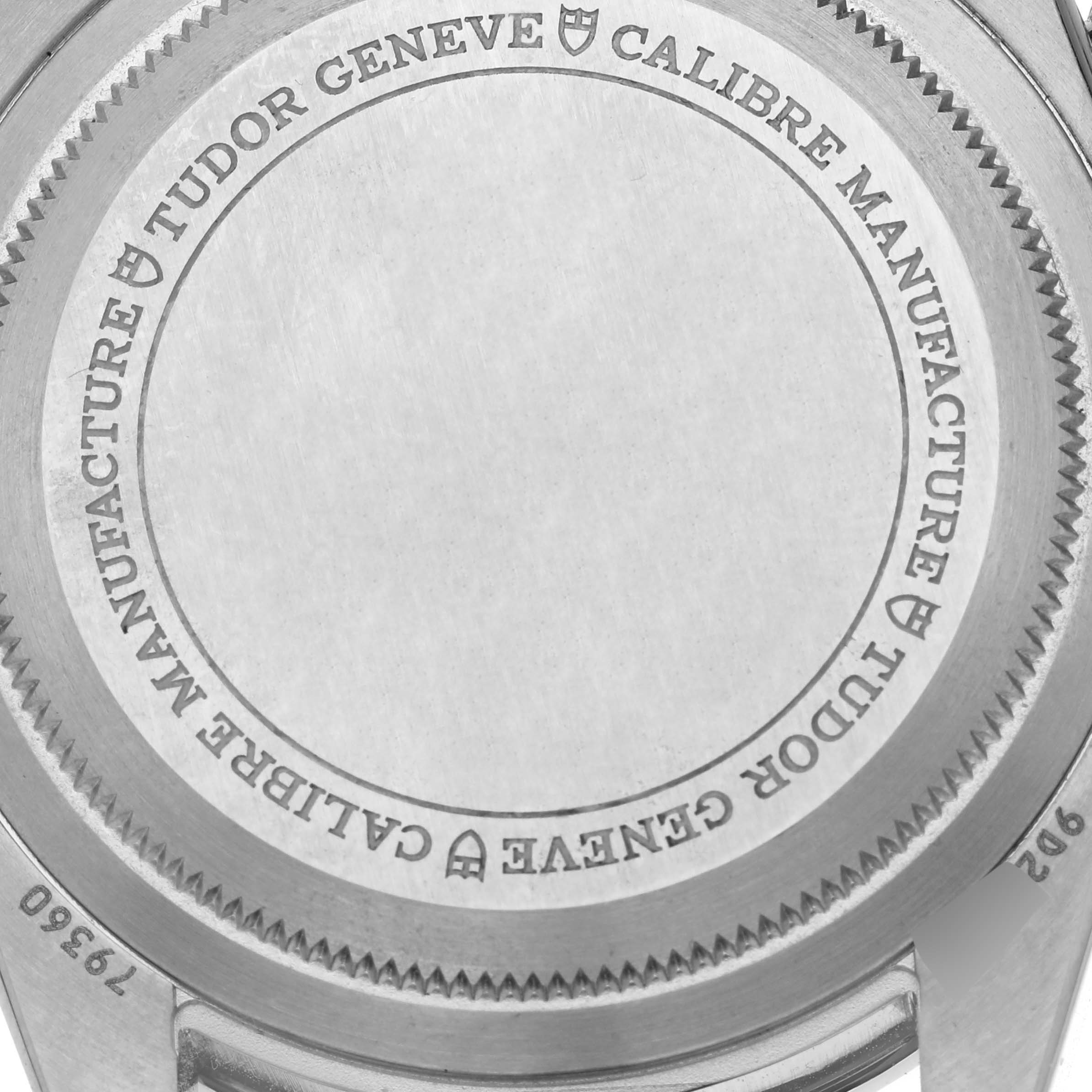 The image shows the case back of the Tudor Heritage Chrono 79360N Men's Stainless Steel Black Dial 79360N Men's Stainless Steel Black Dial watch with engravings.