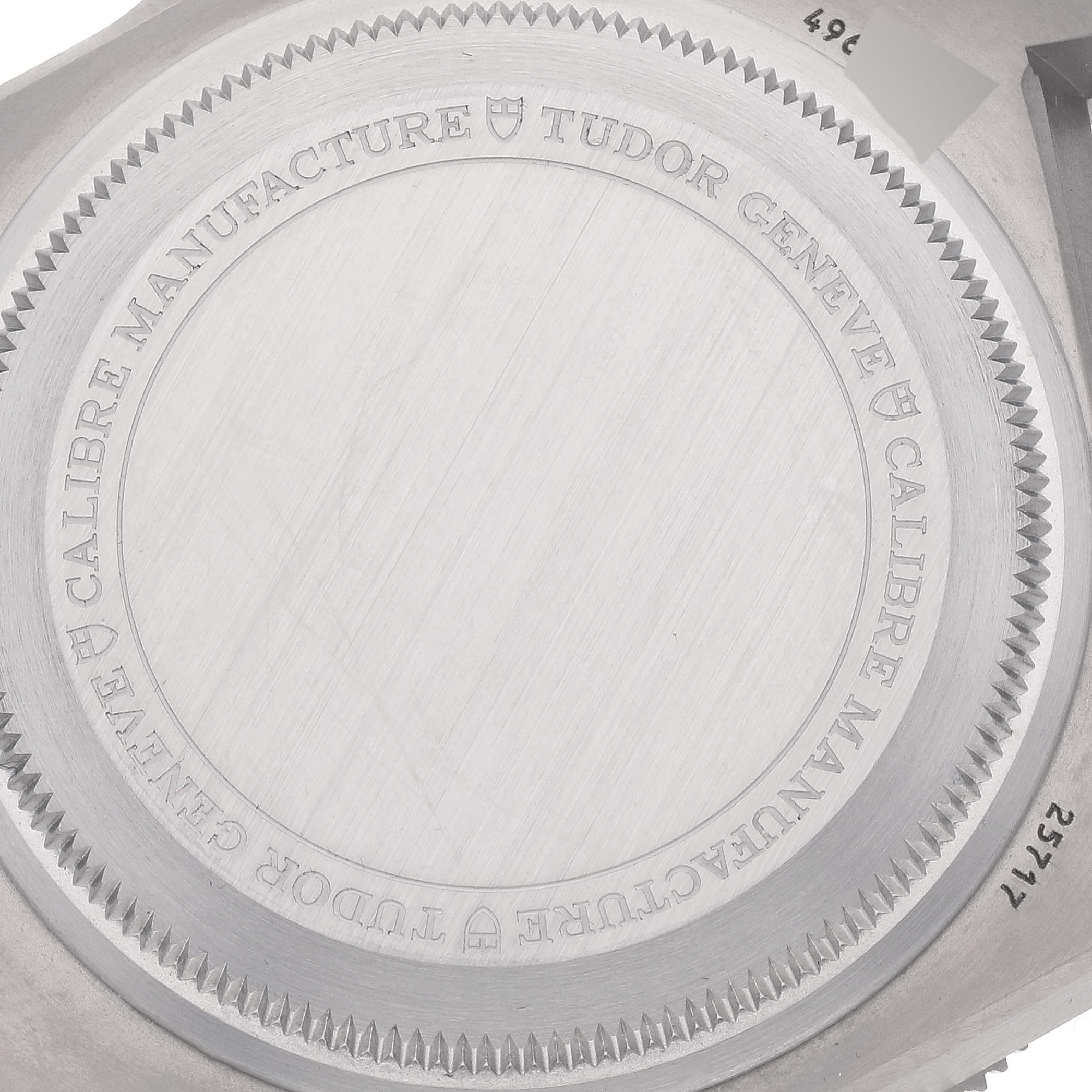 This image shows the backside of the Tudor Pelagos M25717N-0001 Men
s Titanium Black Dial M25717N-0001 Men
s Titanium Black Dial watch with the engraved brand and model details.