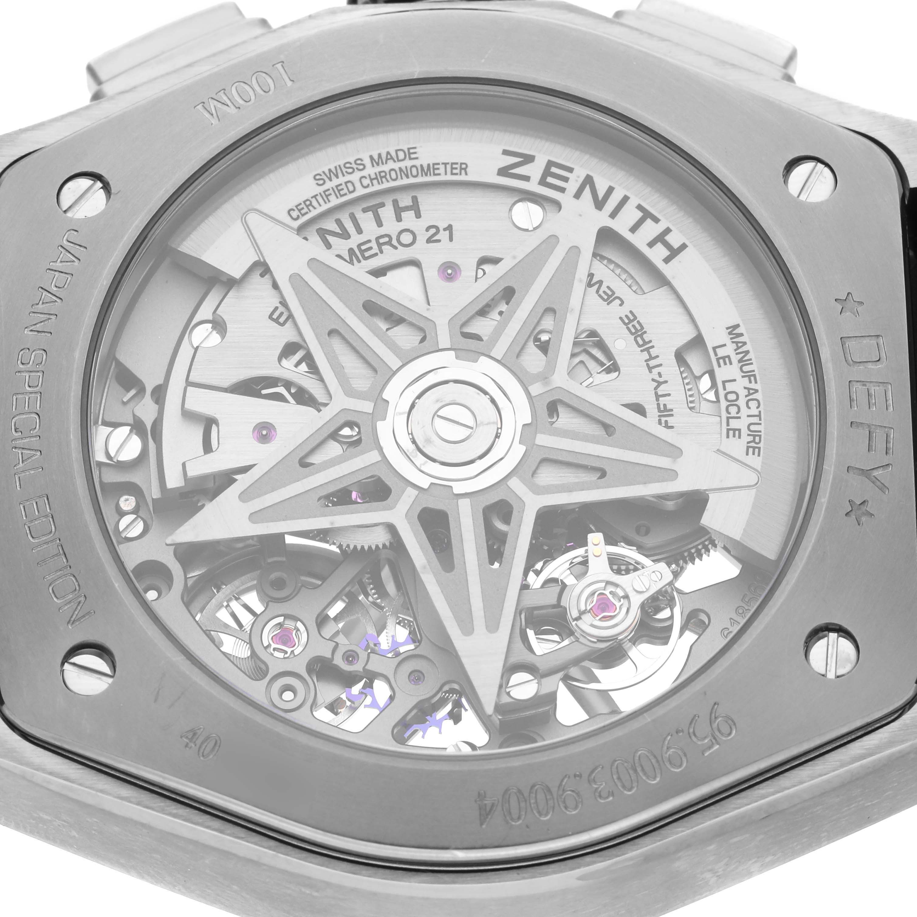 The image shows the back of a Zenith Defy 95.9003.9004/78.R588 Men's Titanium Transparent Dial 95.9003.9004/78.R588 Men's Titanium Transparent Dial watch, highlighting its intricate movement and engravings.