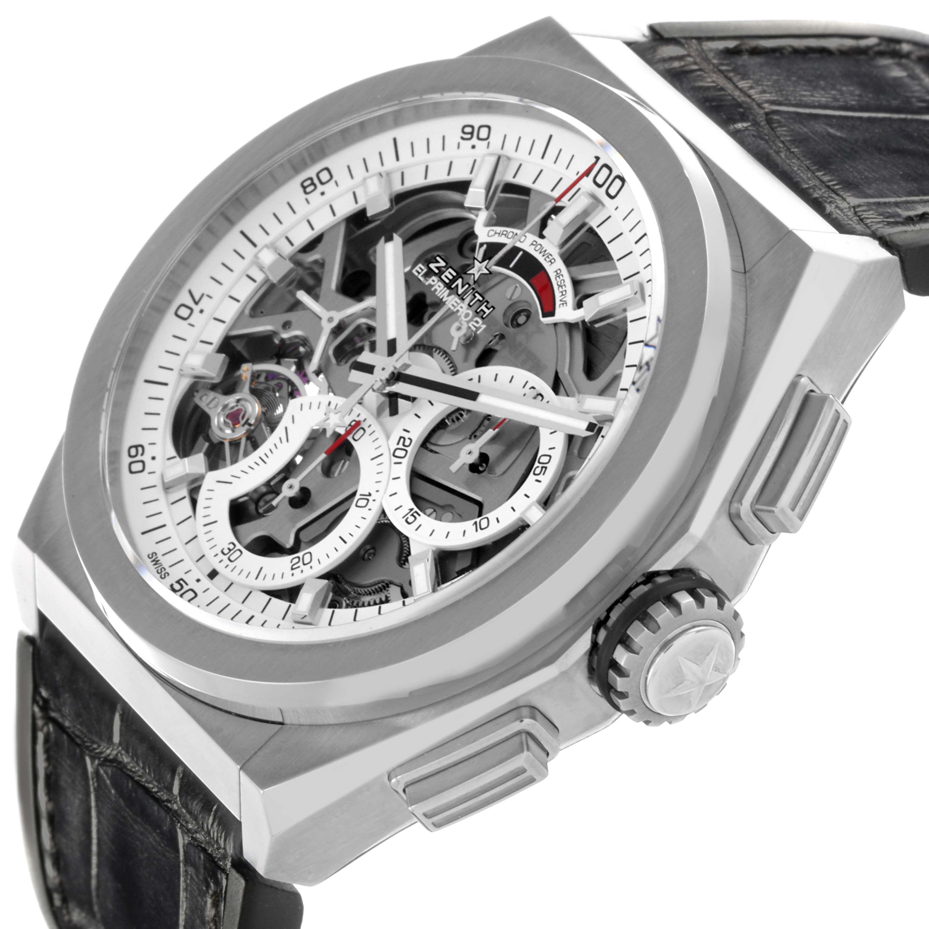 The Zenith Defy 95.9003.9004/78.R588 Men's Titanium Transparent Dial 95.9003.9004/78.R588 Men's Titanium Transparent Dial watch is shown at an oblique angle, highlighting its skeleton dial, crown, and side buttons.