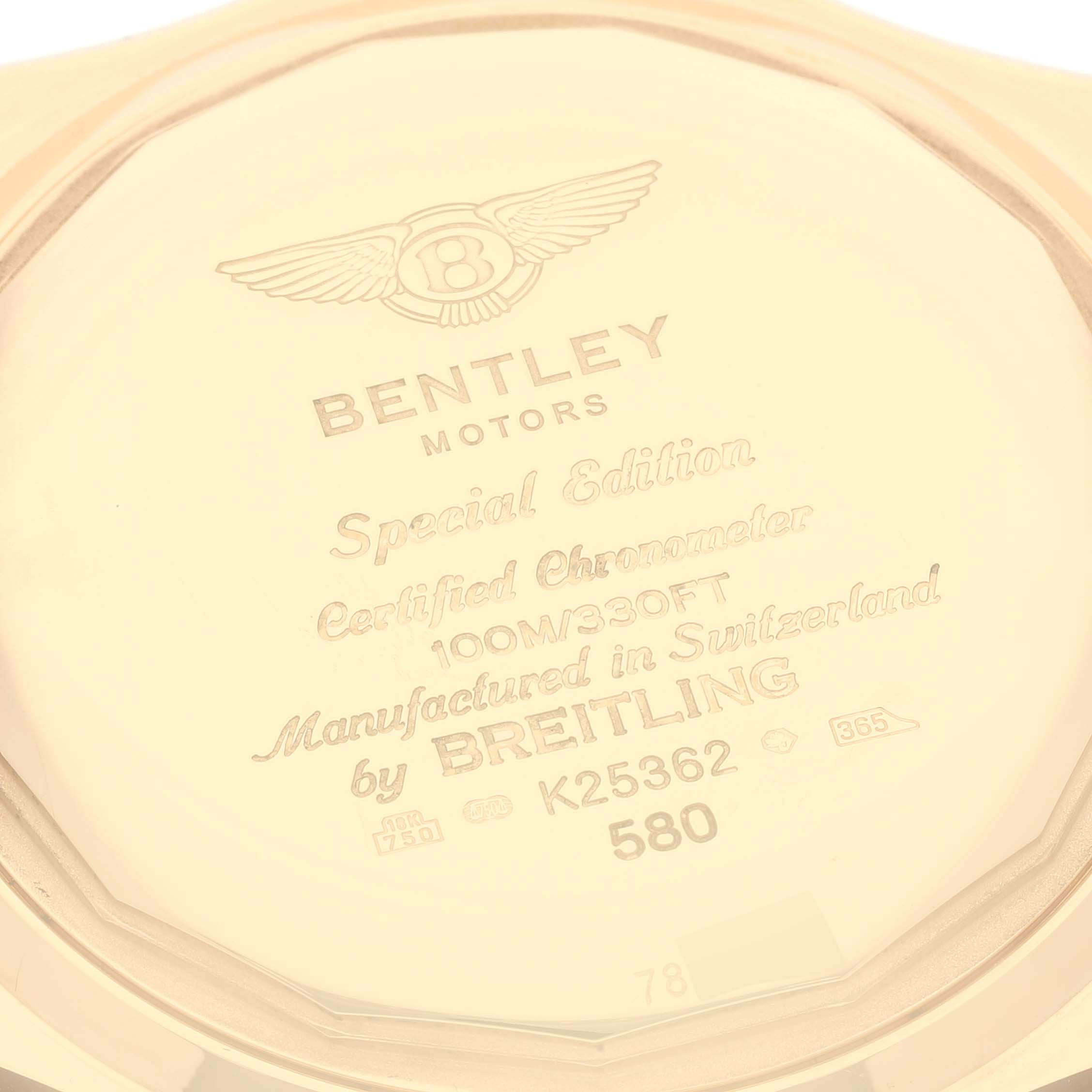 The image shows the back casing of a Breitling Bentley K25362 Men's Yellow Gold Black Dial K25362 Men's Yellow Gold Black Dial Motors Special Edition watch, highlighting its specifications and engravings.