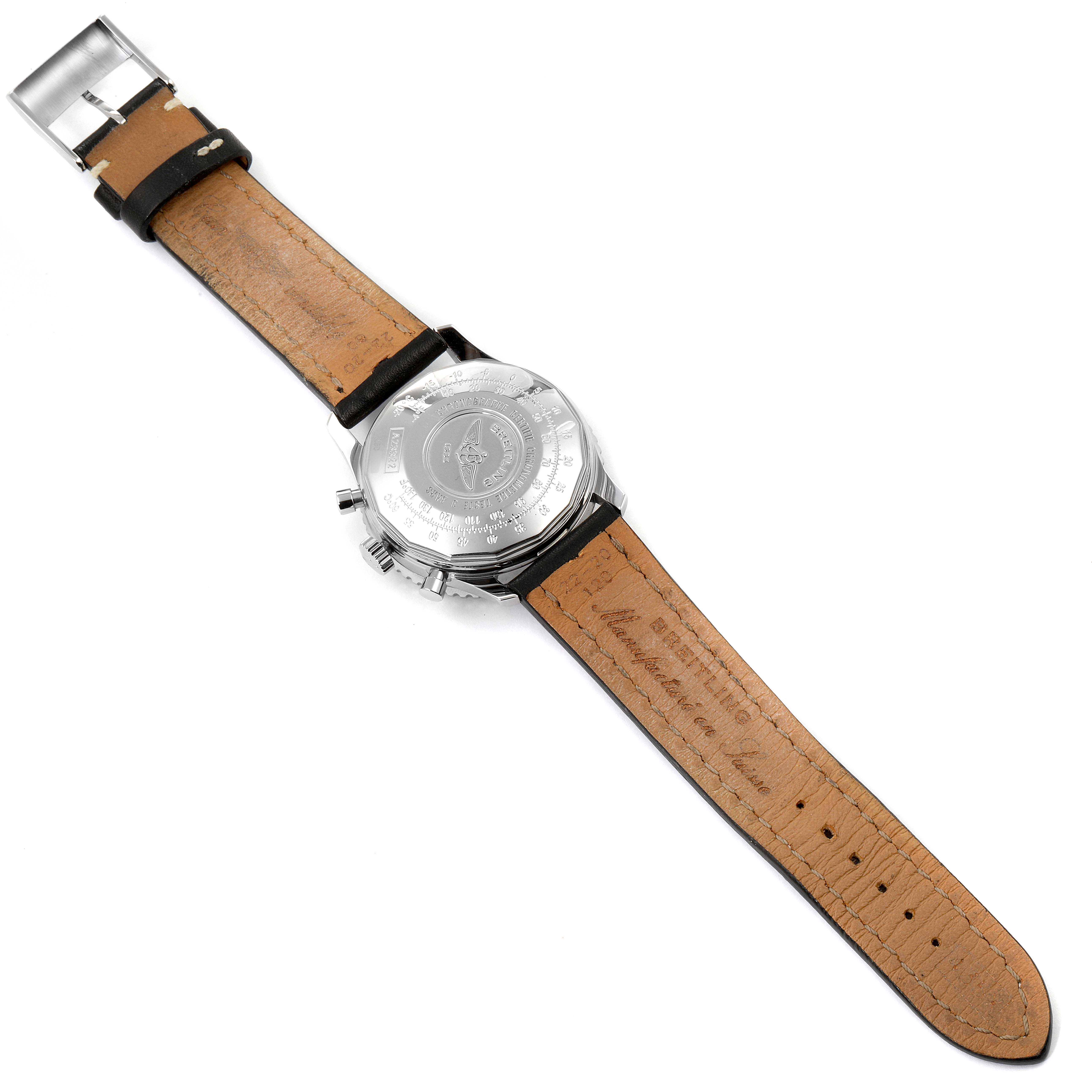 The image shows the back of the Breitling Navitimer A23322 Men's Stainless Steel Black Dial A23322 Men's Stainless Steel Black Dial watch and its leather strap.