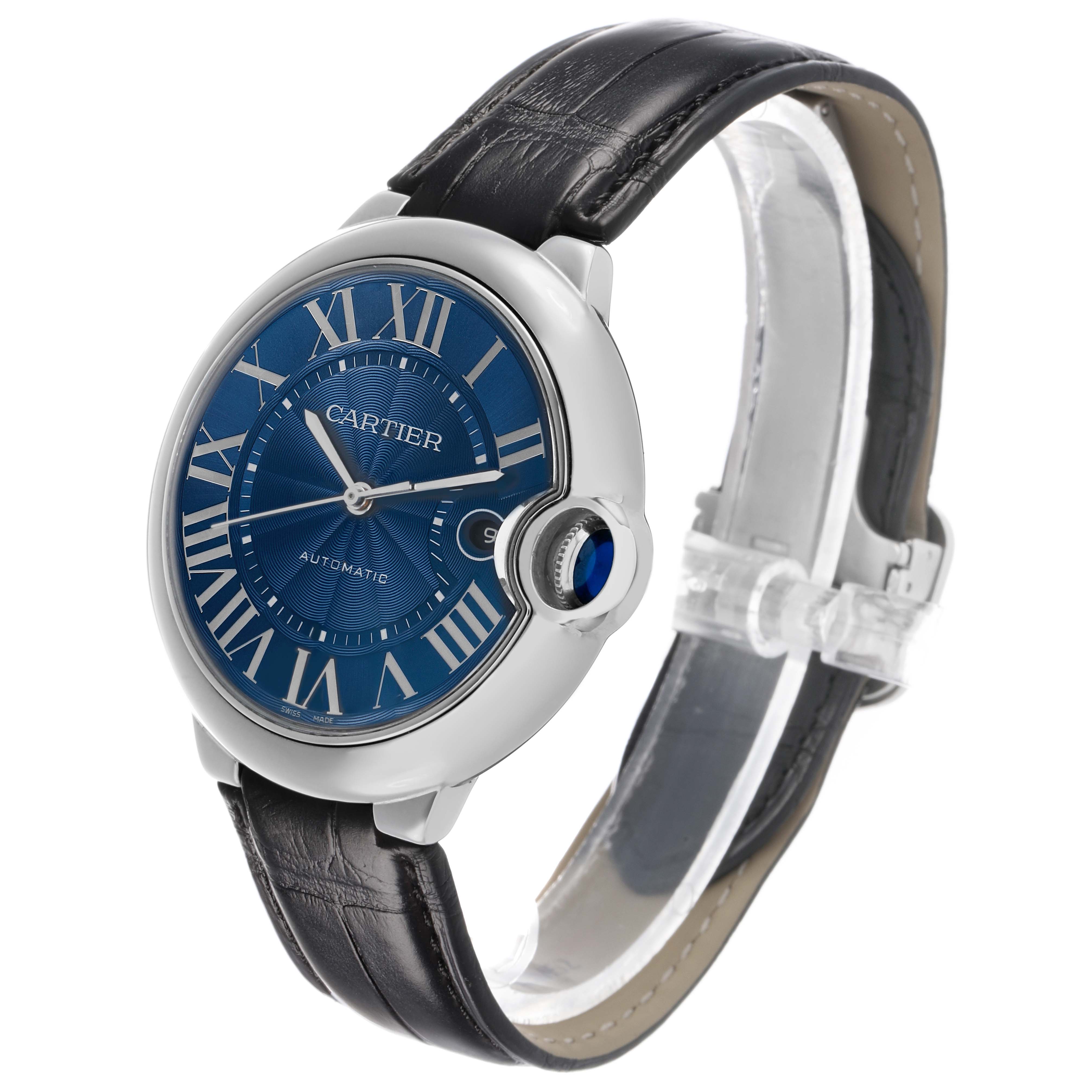 The Cartier Ballon Bleu WSBB0027 Men's Stainless Steel Blue Dial watch is shown at a three-quarter angle highlighting its blue dial, Roman numerals, and black leather strap.