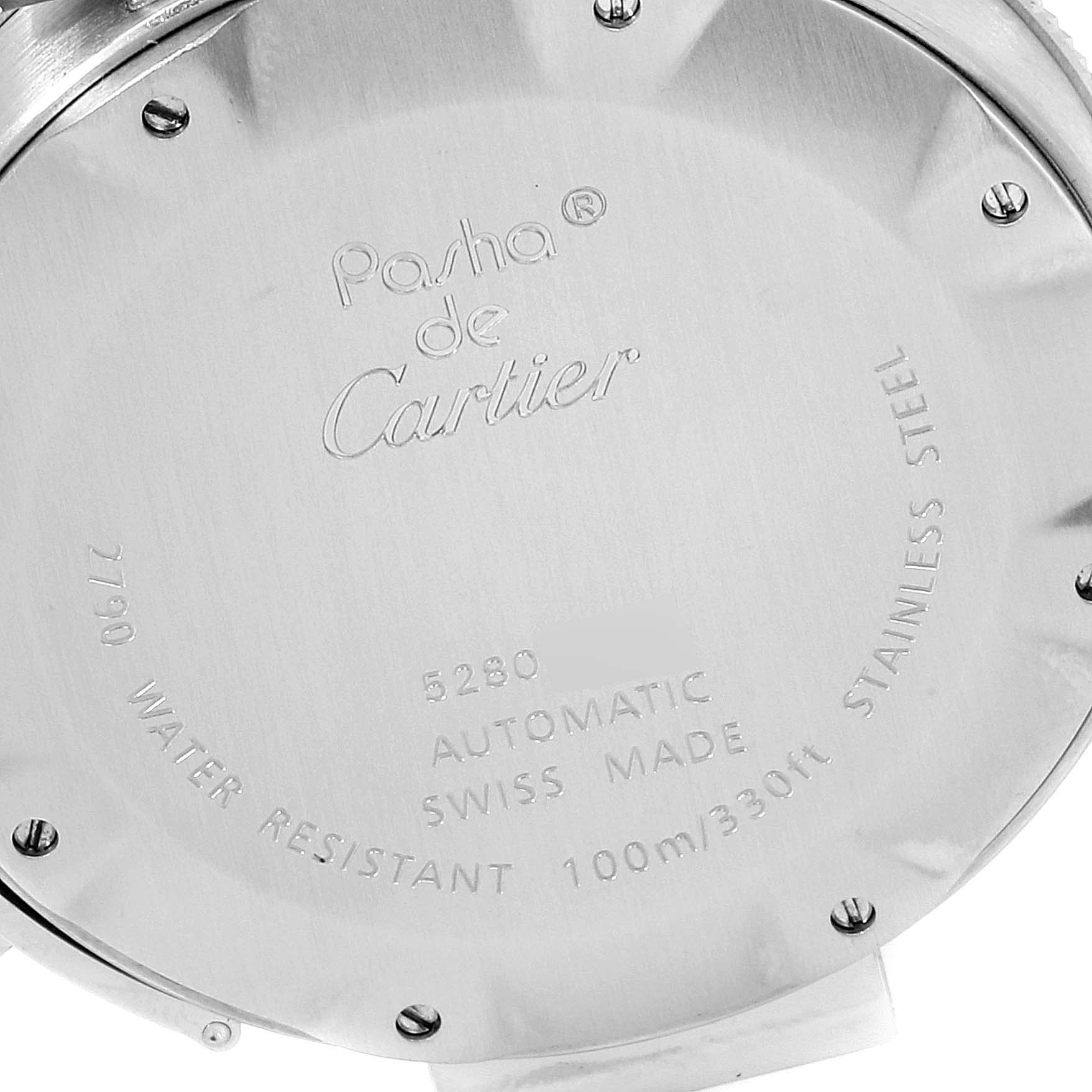 The image shows the back case of a Cartier Pasha W31077M7 Men
s Stainless Steel Black Dial W31077M7 Men
s Stainless Steel Black Dial watch, displaying engravings with model information.