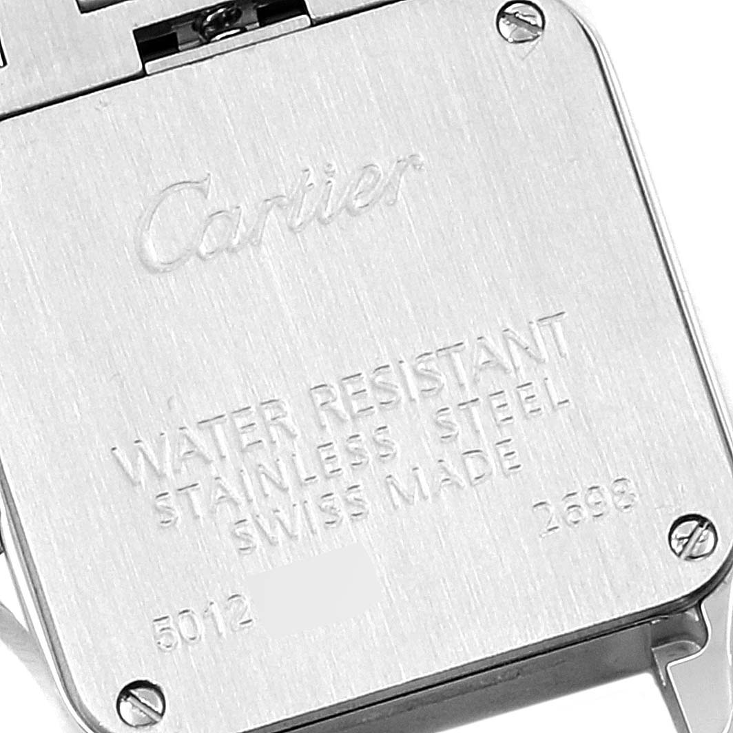 The image shows the back case of a Cartier Santos Demoiselle W25074Y9 Women's Steel and Gold (two tone) Mother of Pearl Dial W25074Y9 Women's Steel and Gold (two tone) Mother of Pearl Dial watch, highlighting its water resistance and stainless steel material.