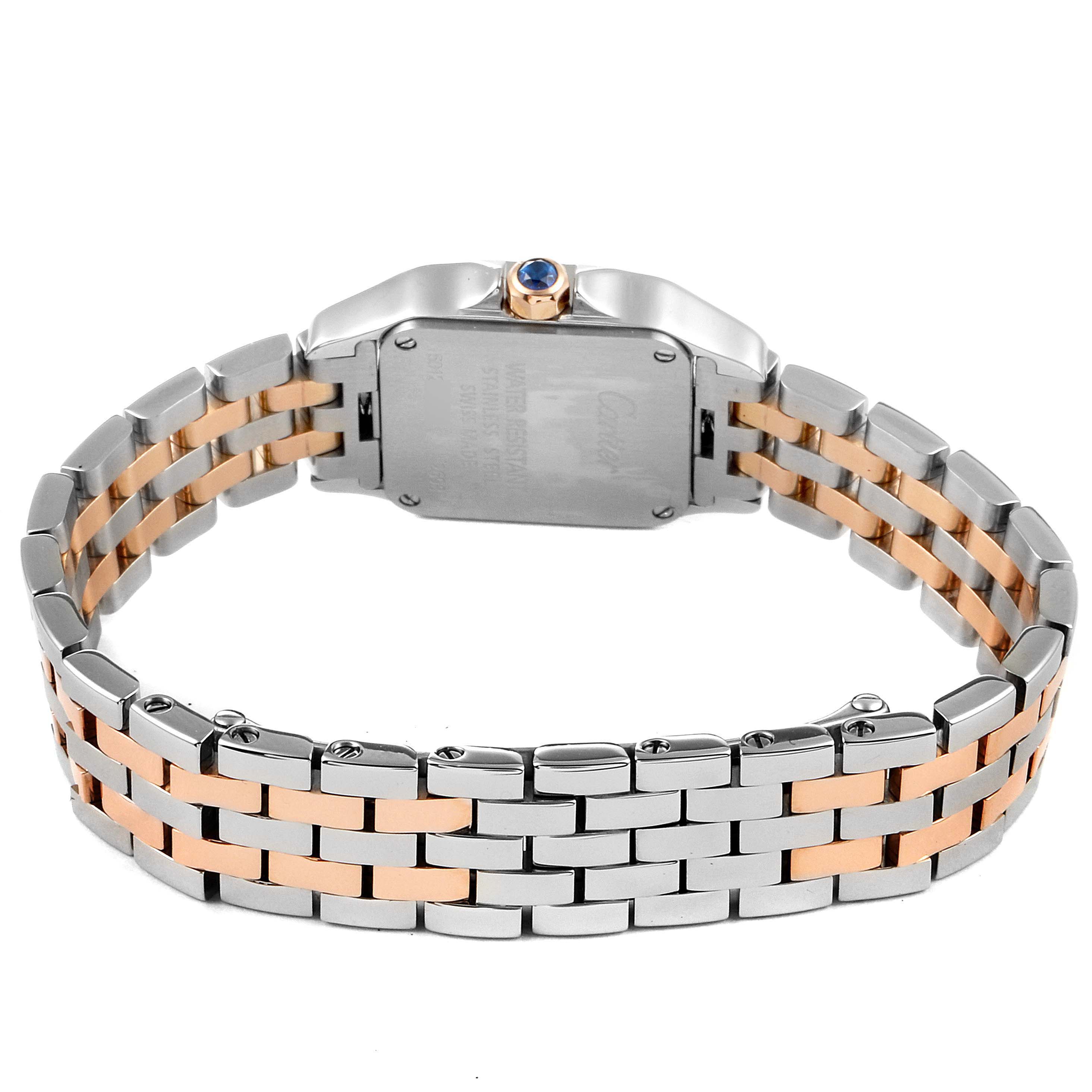 The image shows the back and bracelet of the Cartier Santos Demoiselle W25074Y9 Women's Steel and Gold (two tone) Mother of Pearl Dial W25074Y9 Women's Steel and Gold (two tone) Mother of Pearl Dial watch, highlighting its two-tone metal links and crown.