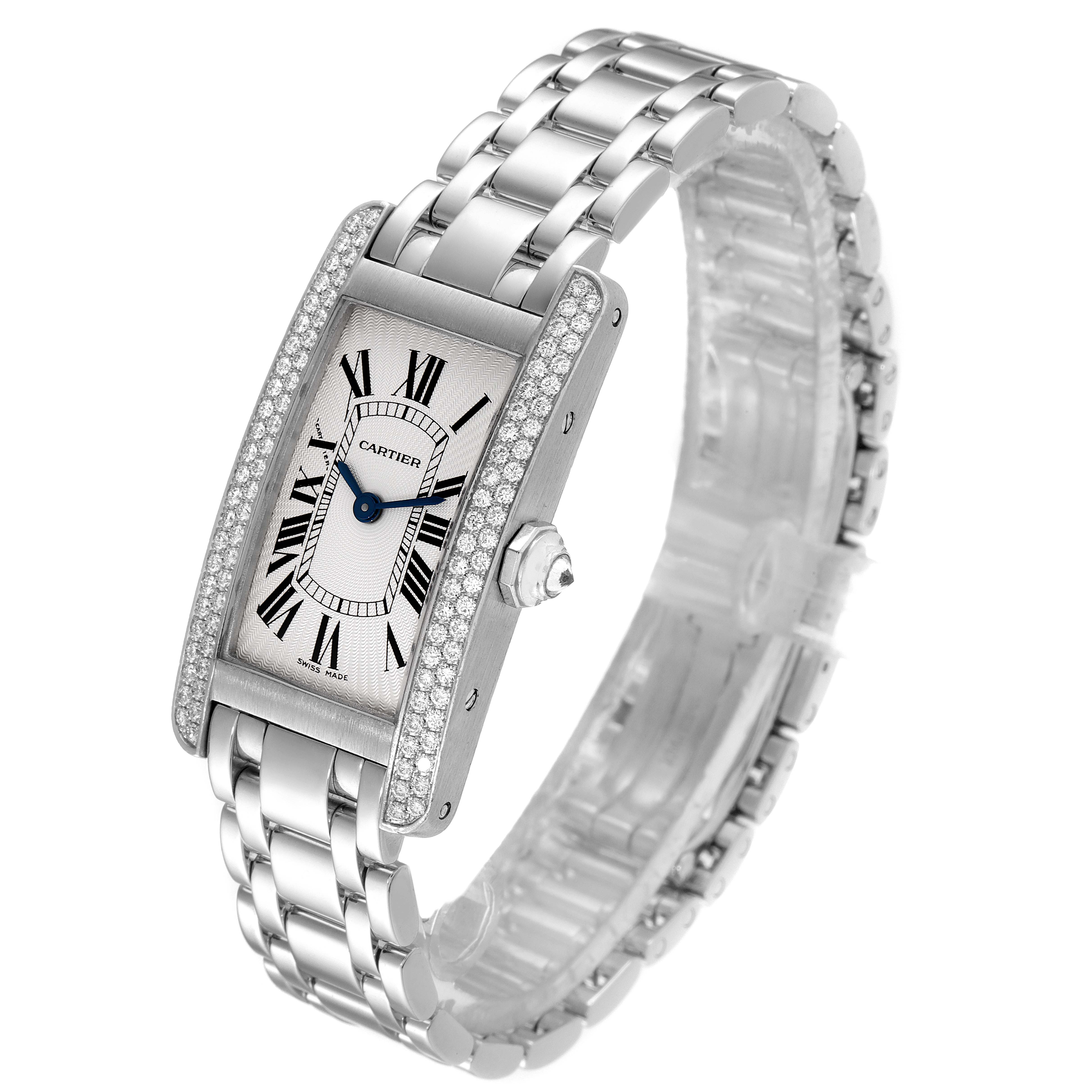 This is a Cartier Tank Americaine WB7018L1 Women's White Gold Silver Dial WB7018L1 Women's White Gold Silver Dial watch shown at an angle displaying its face, crown, bracelet, and bezel with diamonds.