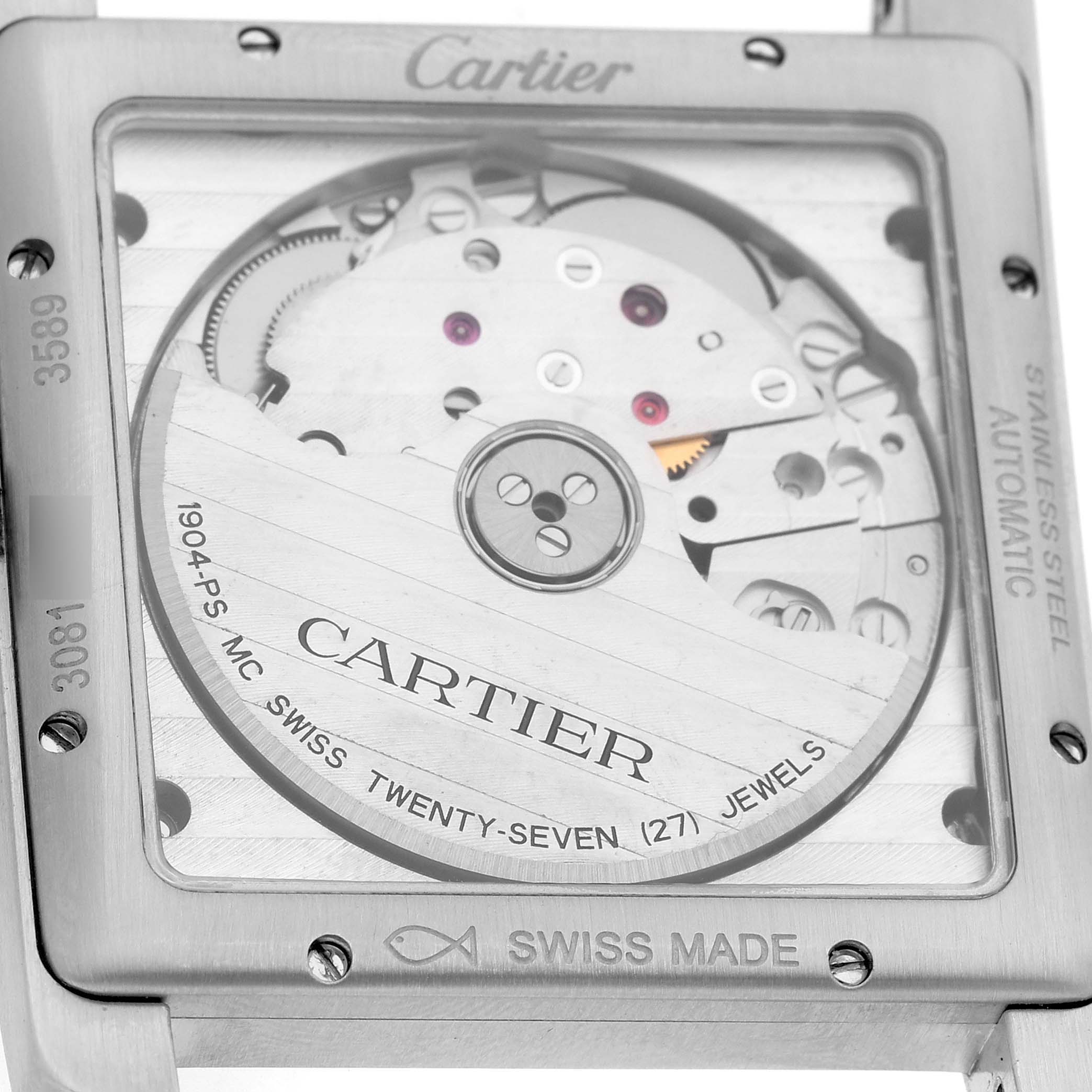 The image shows the back view of a Cartier Tank MC WSTA0010 Men's Stainless Steel Blue Dial watch, highlighting its automatic movement and internal mechanisms.