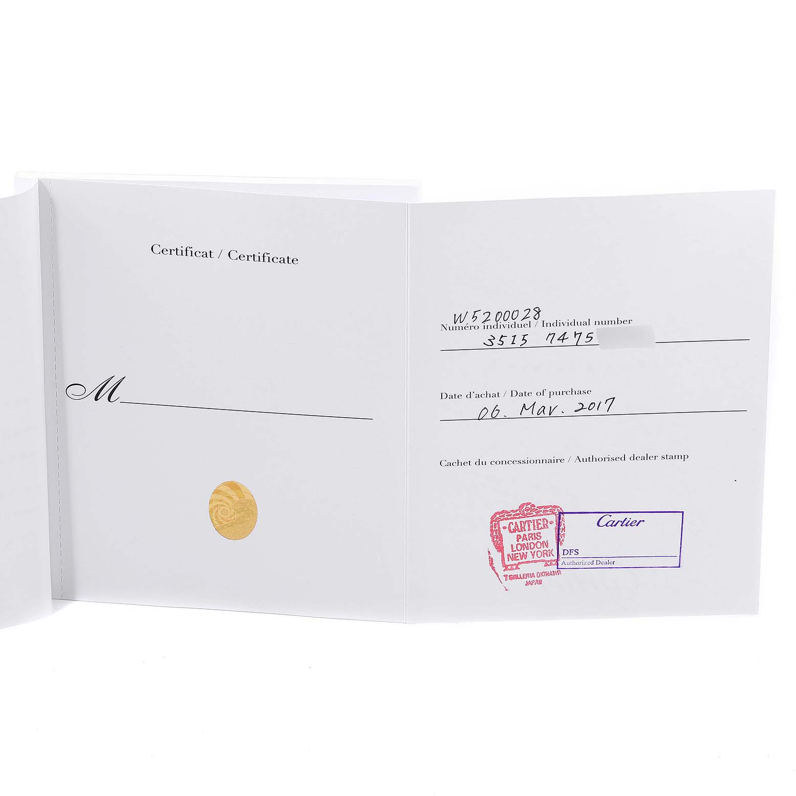 The image shows the warranty certificate for the Tank Solo model by Cartier, including date of purchase and dealer stamps.