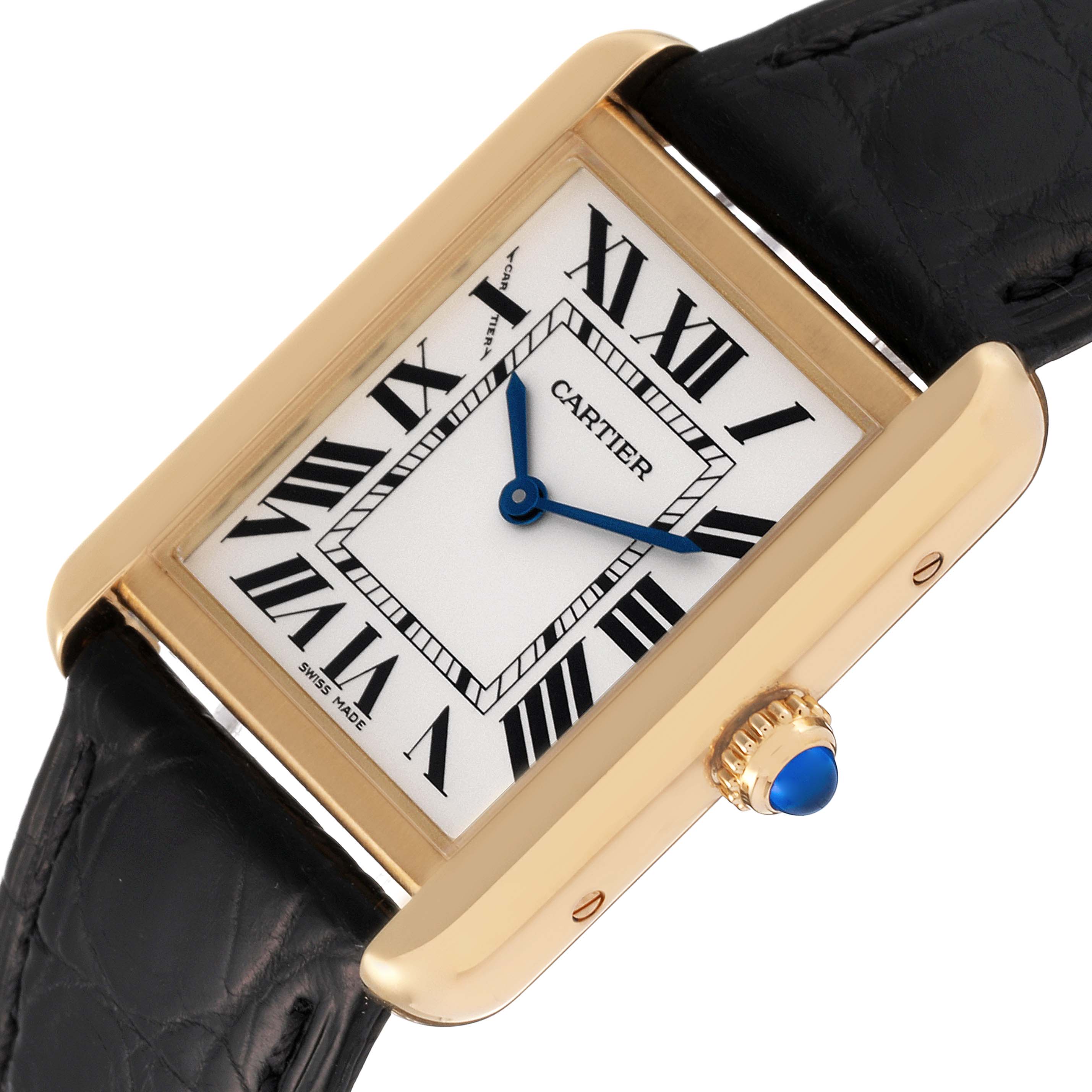 The Cartier Tank Solo W5200002 Women
s Yellow Gold Silver Dial W5200002 Women
s Yellow Gold Silver Dial watch is shown at an angle highlighting the face, blue hands, Roman numerals, gold case, and black leather strap.