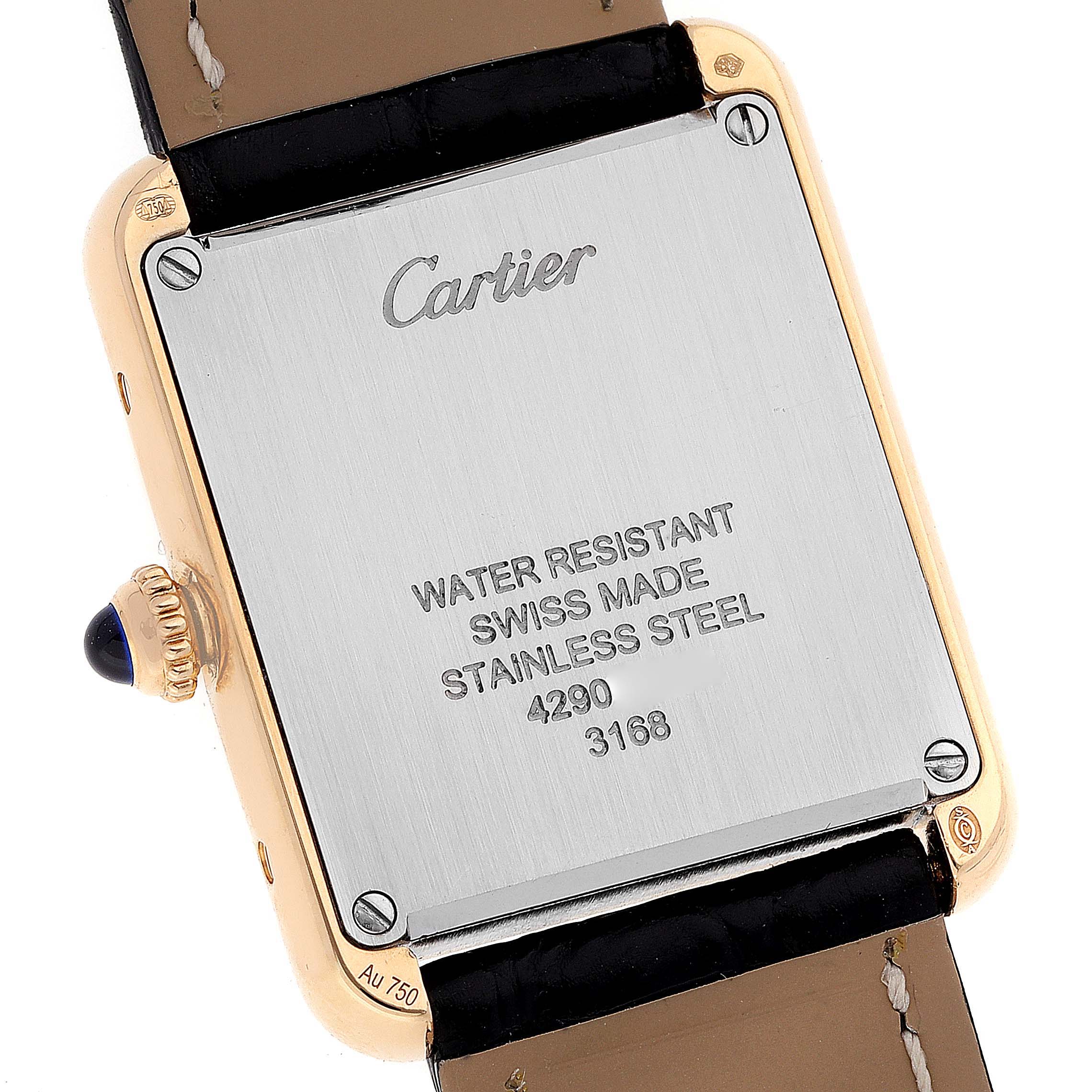 This image shows the back case of a Cartier Tank Solo W5200002 Women
s Yellow Gold Silver Dial W5200002 Women
s Yellow Gold Silver Dial watch, highlighting the engraved details and leather strap attachment points.