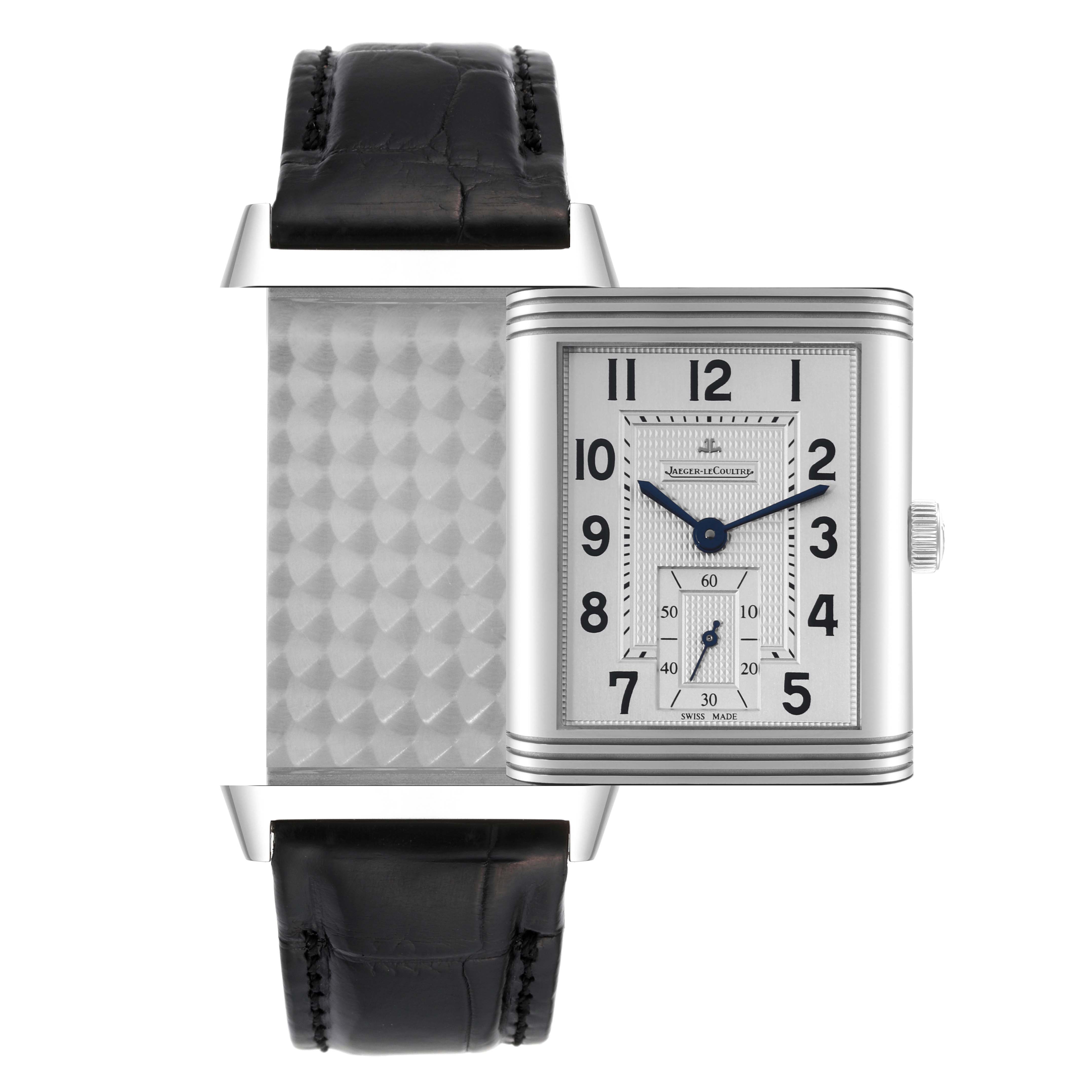 The image shows a frontal view of the Jaeger-LeCoultre Reverso watch, displaying both its dial and its distinctive reversible case back.
