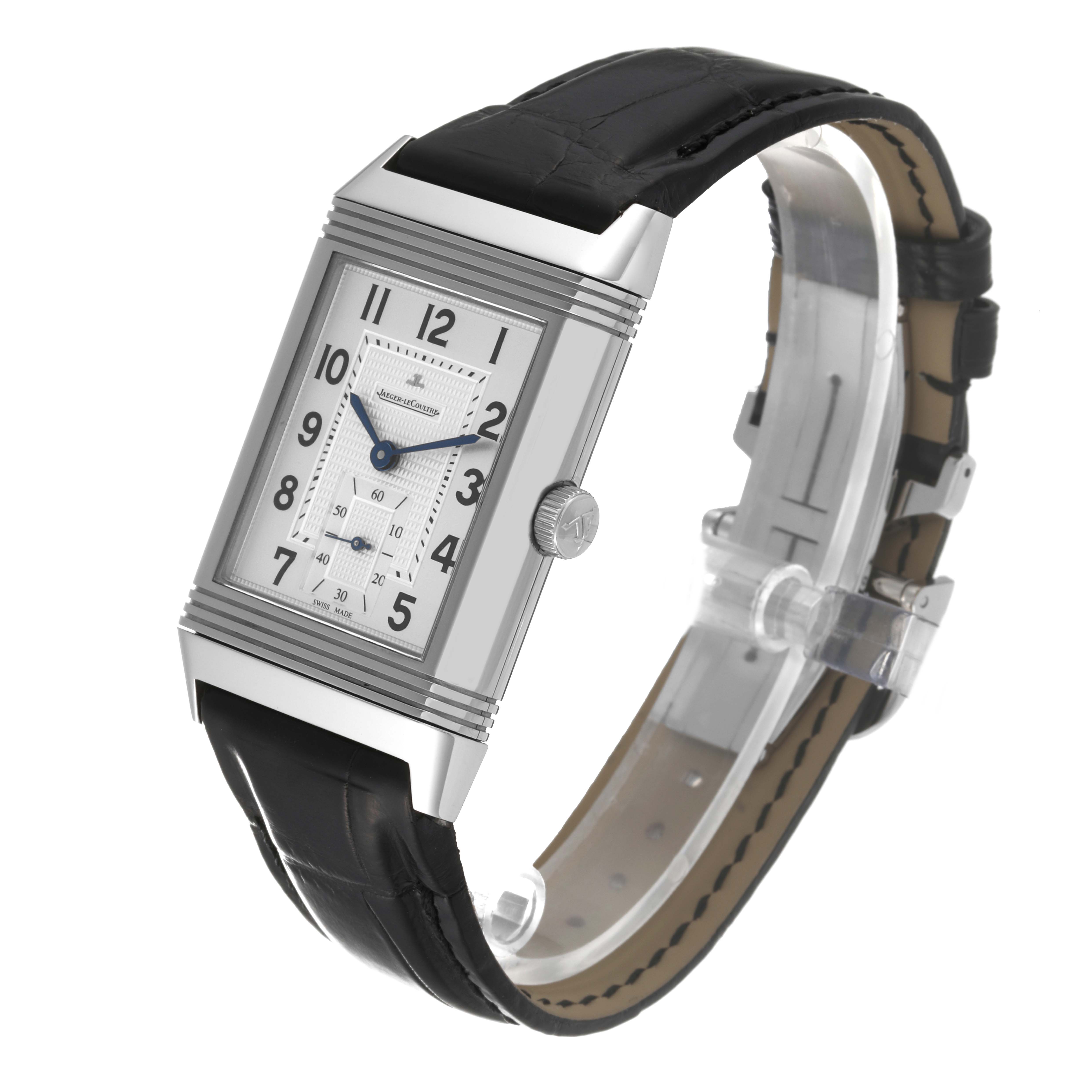 The Jaeger LeCoultre Reverso Q3738420 Men's Stainless Steel Silver Dial Q3738420 Men's Stainless Steel Silver Dial watch is shown at an angle highlighting the rectangular face, strap, crown, and clasp.