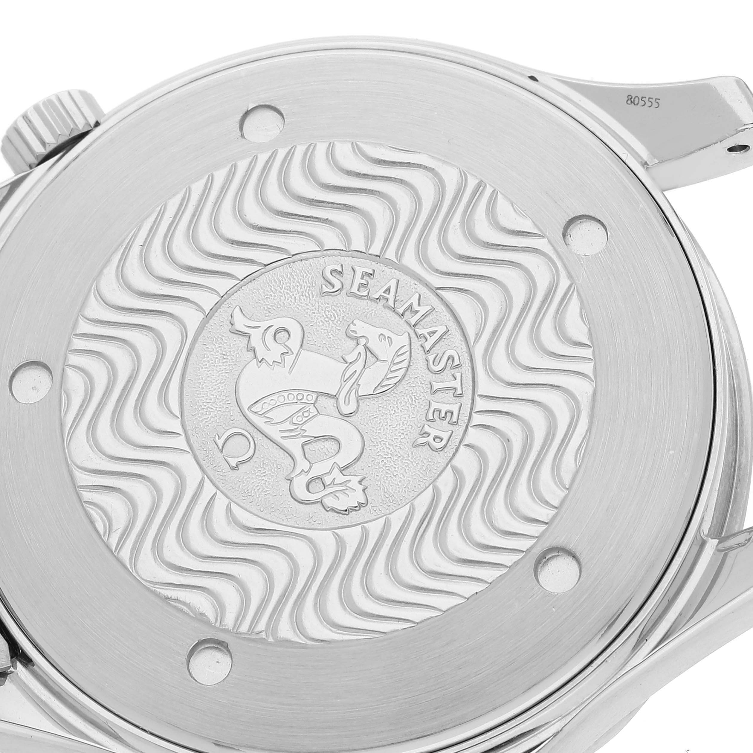 This image shows the case back of an Omega Seamaster 2255.80.00 Men's Stainless Steel Blue Dial 2255.80.00 Men's Stainless Steel Blue Dial watch, featuring an engraved wavy pattern and logo.