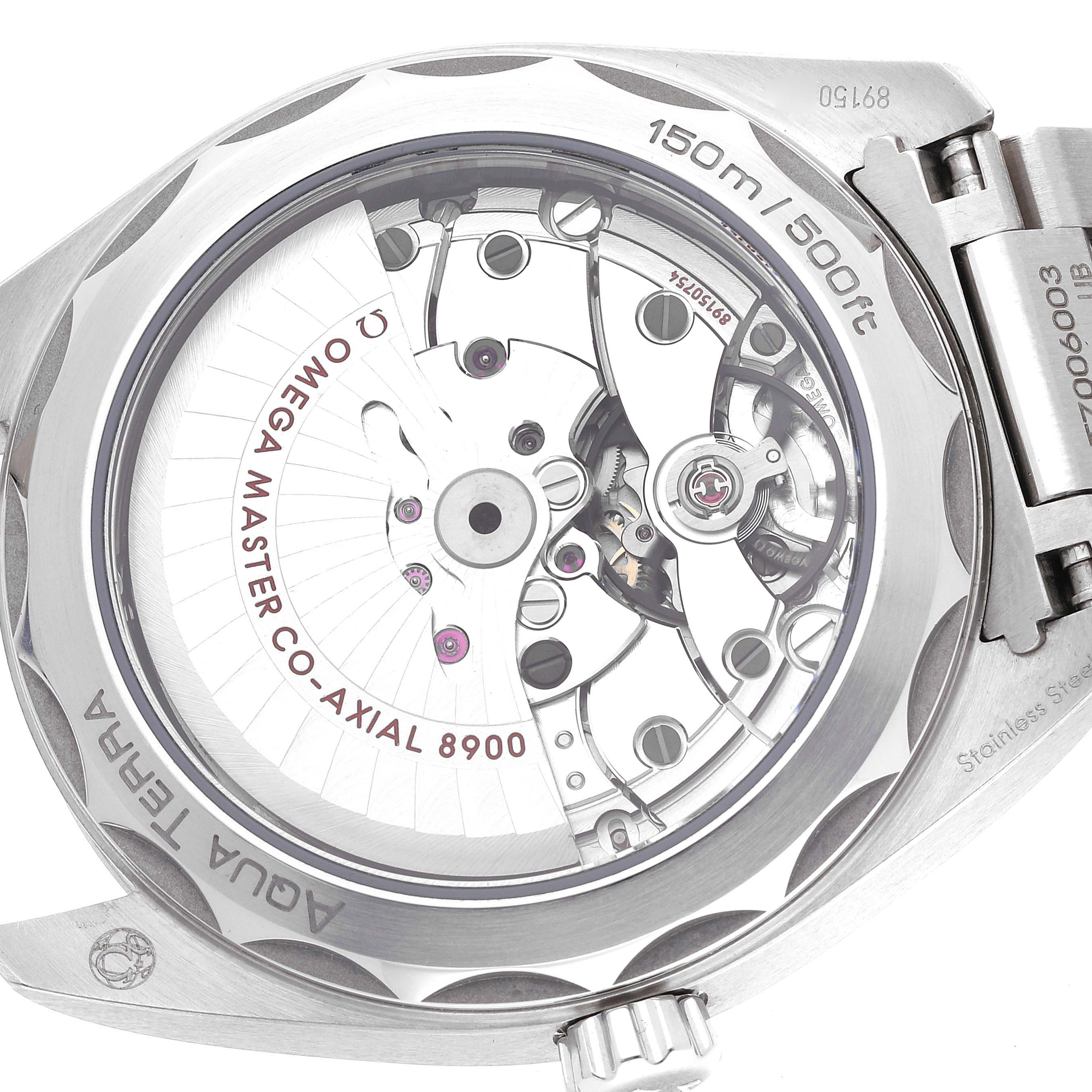 The image shows the back view of an Omega Aqua Terra 220.10.41.21.06.001 Men's Stainless Steel Grey Dial 220.10.41.21.06.001 Men's Stainless Steel Grey Dial watch, highlighting its mechanism and Co-Axial 8900 movement.