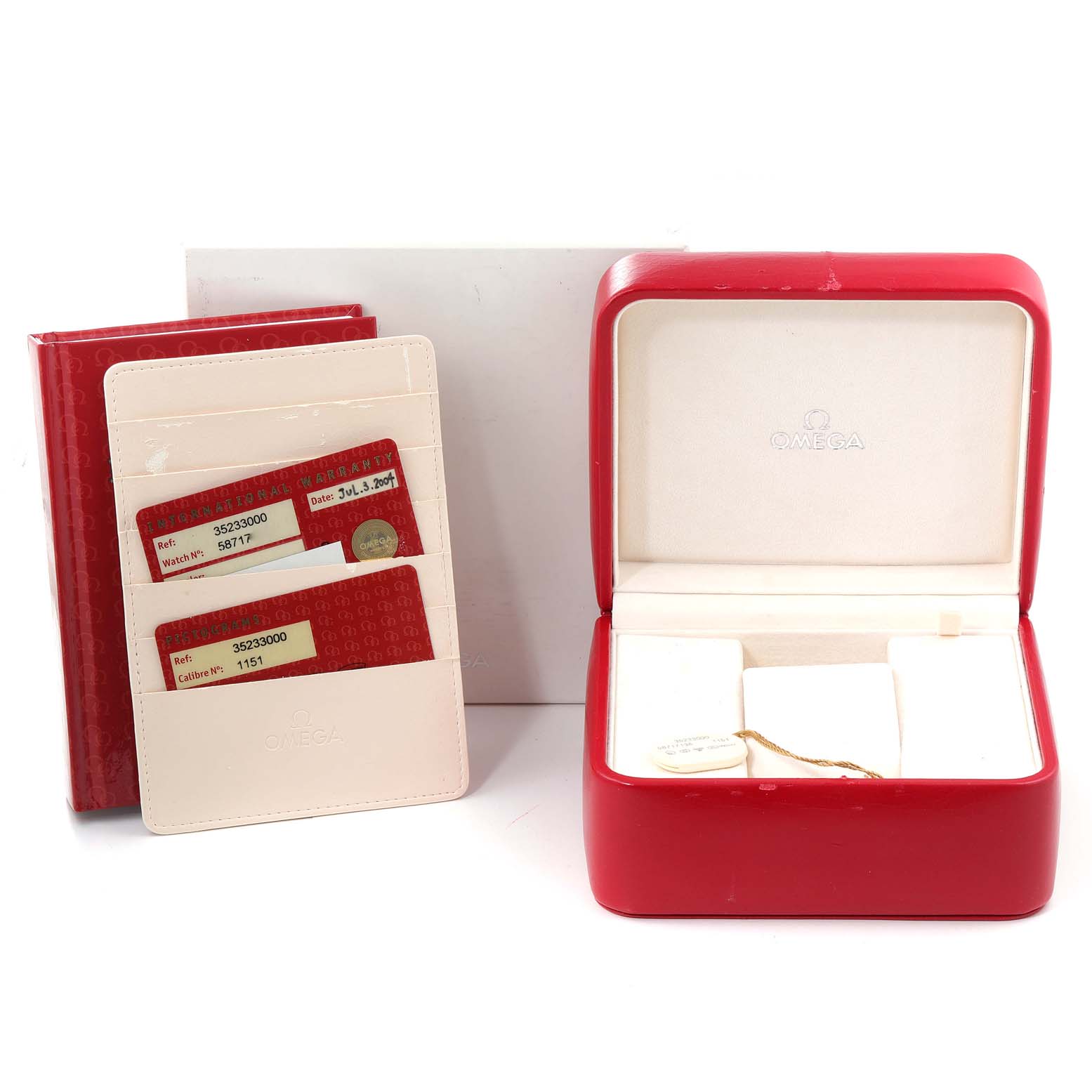 The image shows an Omega Speedmaster 3523.30.00 Men's Stainless Steel Silver Dial 3523.30.00 Men's Stainless Steel Silver Dial watch box, warranty cards, and a cardholder from a front angle.