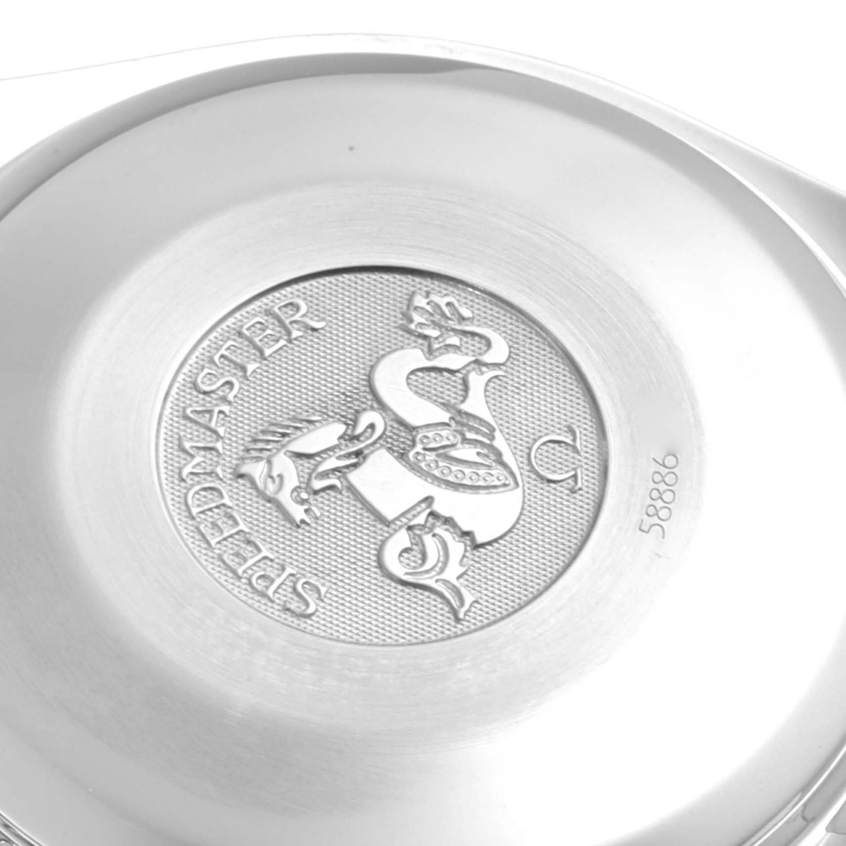 This image shows a close-up of the case back of the Omega Speedmaster 3523.30.00 Men's Stainless Steel Silver Dial 3523.30.00 Men's Stainless Steel Silver Dial watch with its emblem and model name.