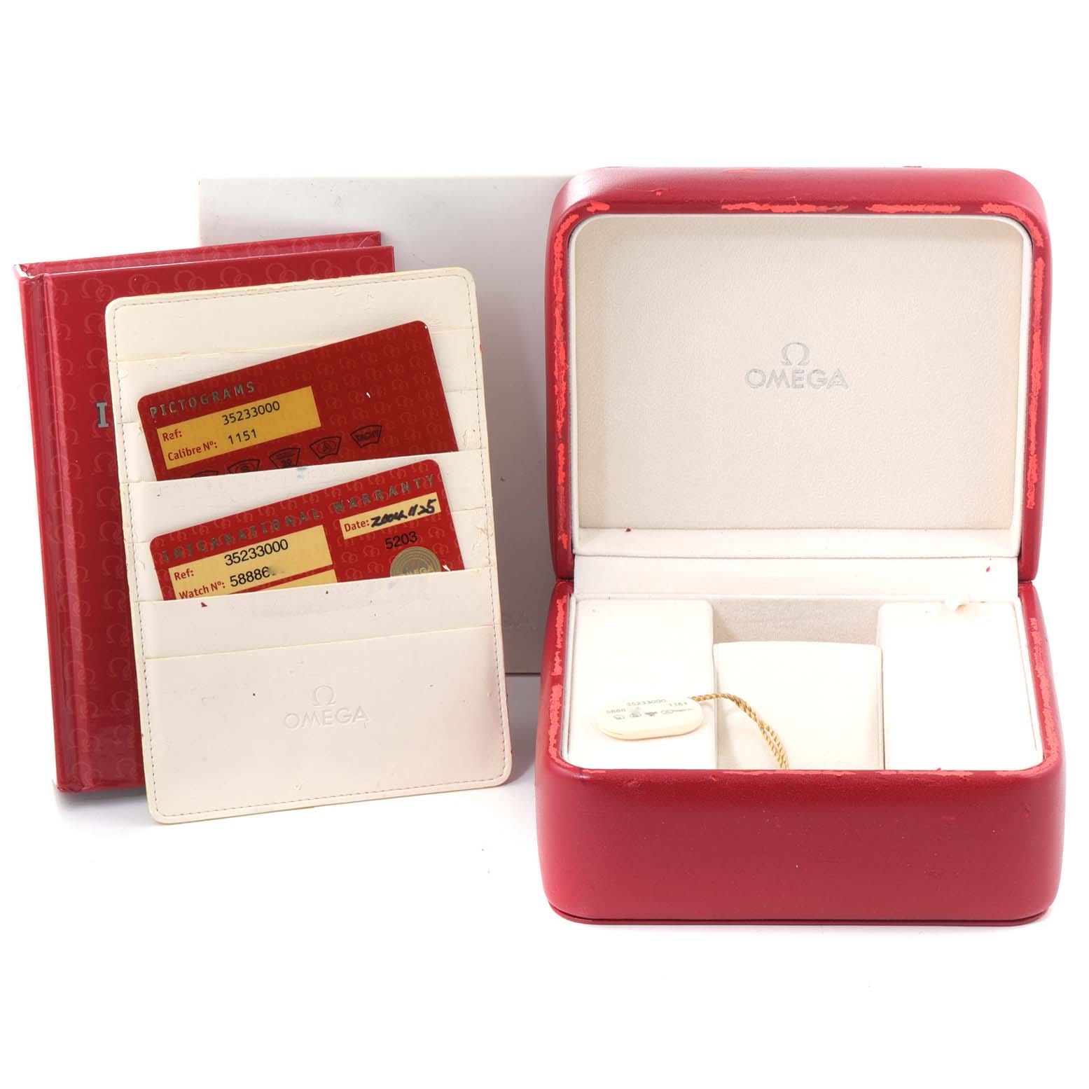 The image shows an Omega Speedmaster 3523.30.00 Men's Stainless Steel Silver Dial 3523.30.00 Men's Stainless Steel Silver Dial watch box, warranty cards, and an instruction manual holder.