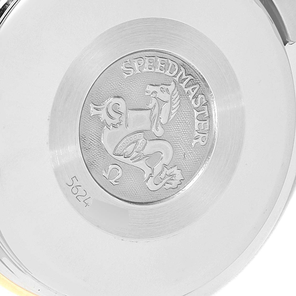 This image shows the case back of the Omega Speedmaster 3313.53.00 Men's Steel and Gold (two tone) Black Dial 3313.53.00 Men's Steel and Gold (two tone) Black Dial watch, featuring the Speedmaster logo and an engraving.