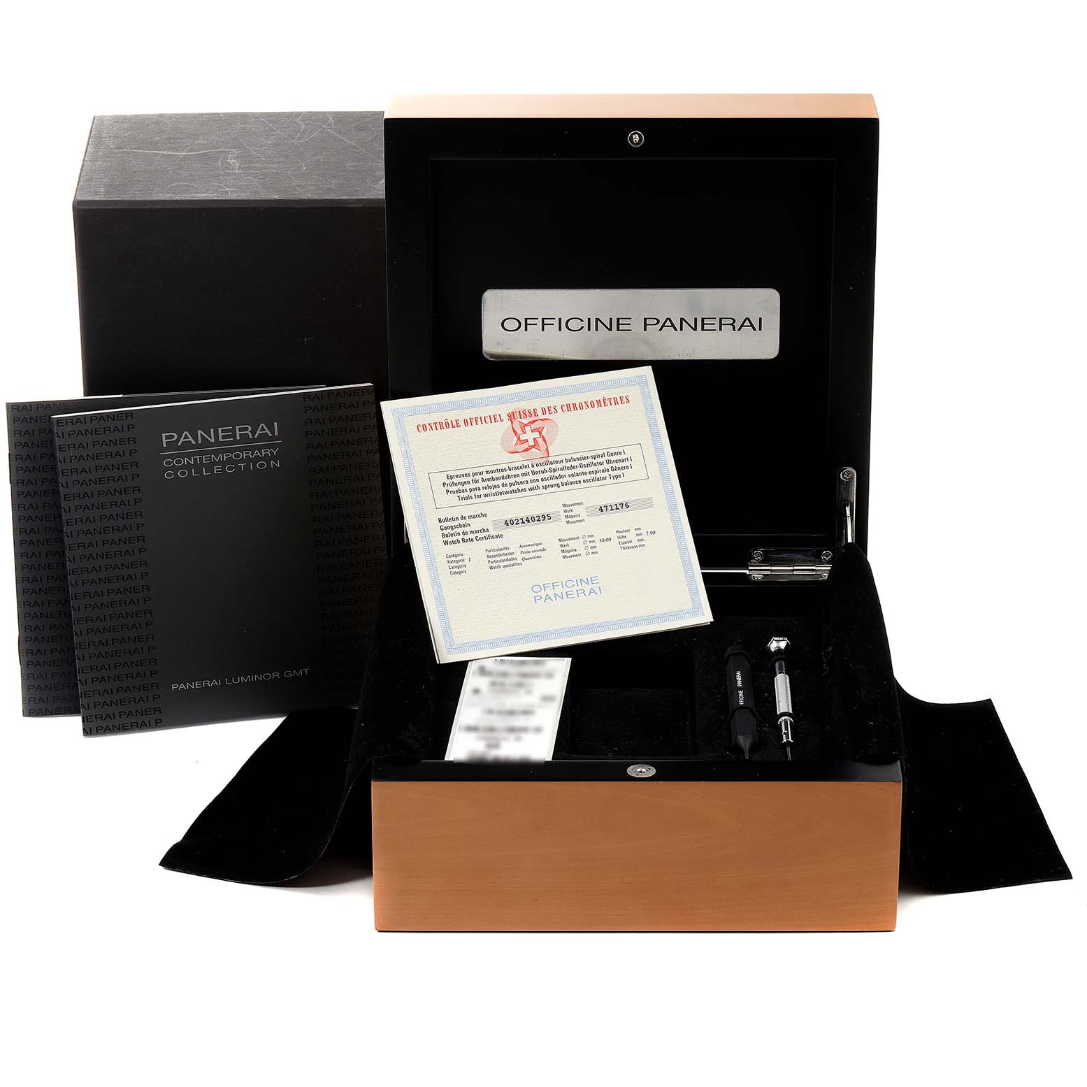 The image showcases Panerai's Luminor model packaging, tools, certificates, and documents from a frontal angle.