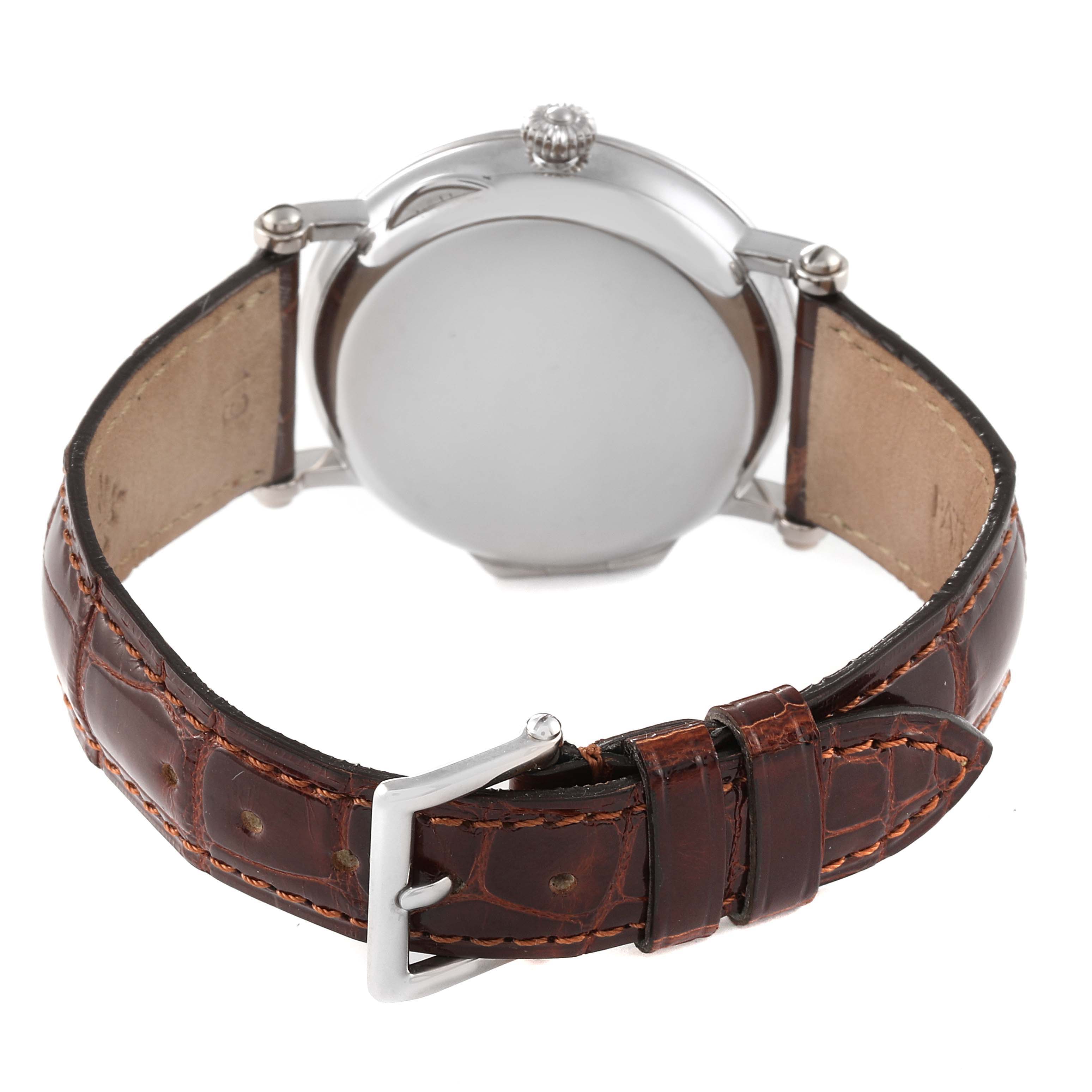 The image shows the back view of a Patek Philippe Calatrava 5053 Men's White Gold Beige Dial 5053 Men's White Gold Beige Dial watch, highlighting its leather strap and metal buckle.