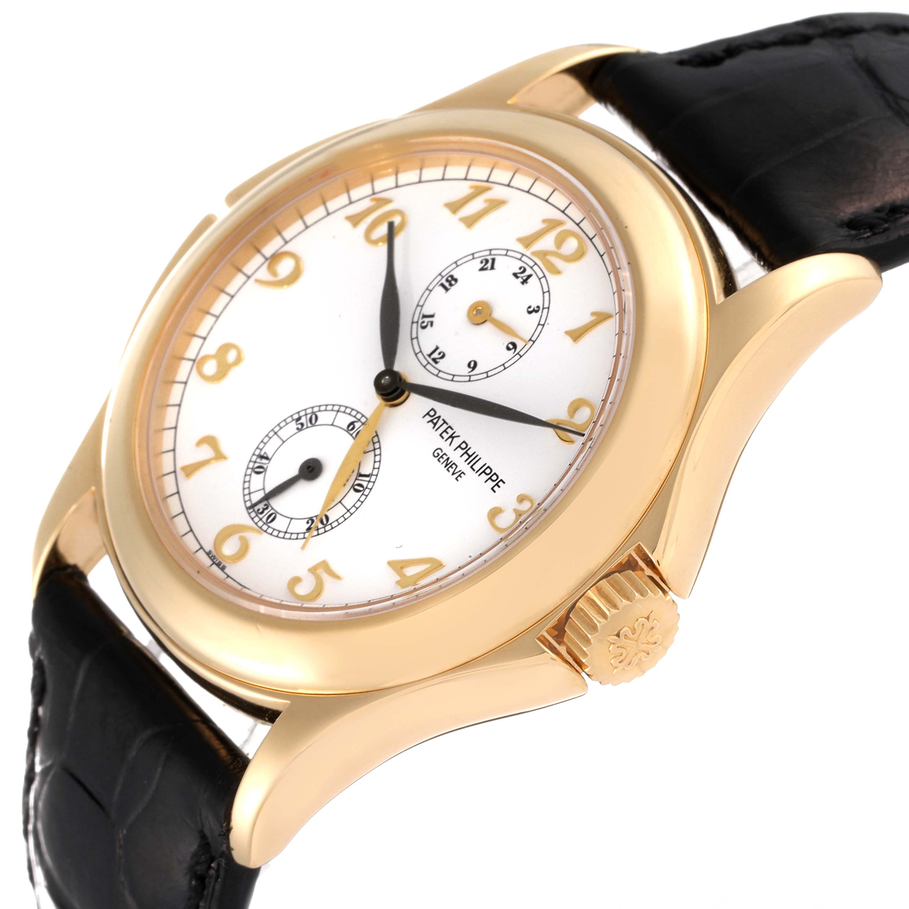 This image shows a Patek Philippe Calatrava 5134J Men
s Yellow Gold White Dial 5134J Men
s Yellow Gold White Dial watch at a tilted angle, highlighting the dial, numerals, hands, crown, and leather strap.