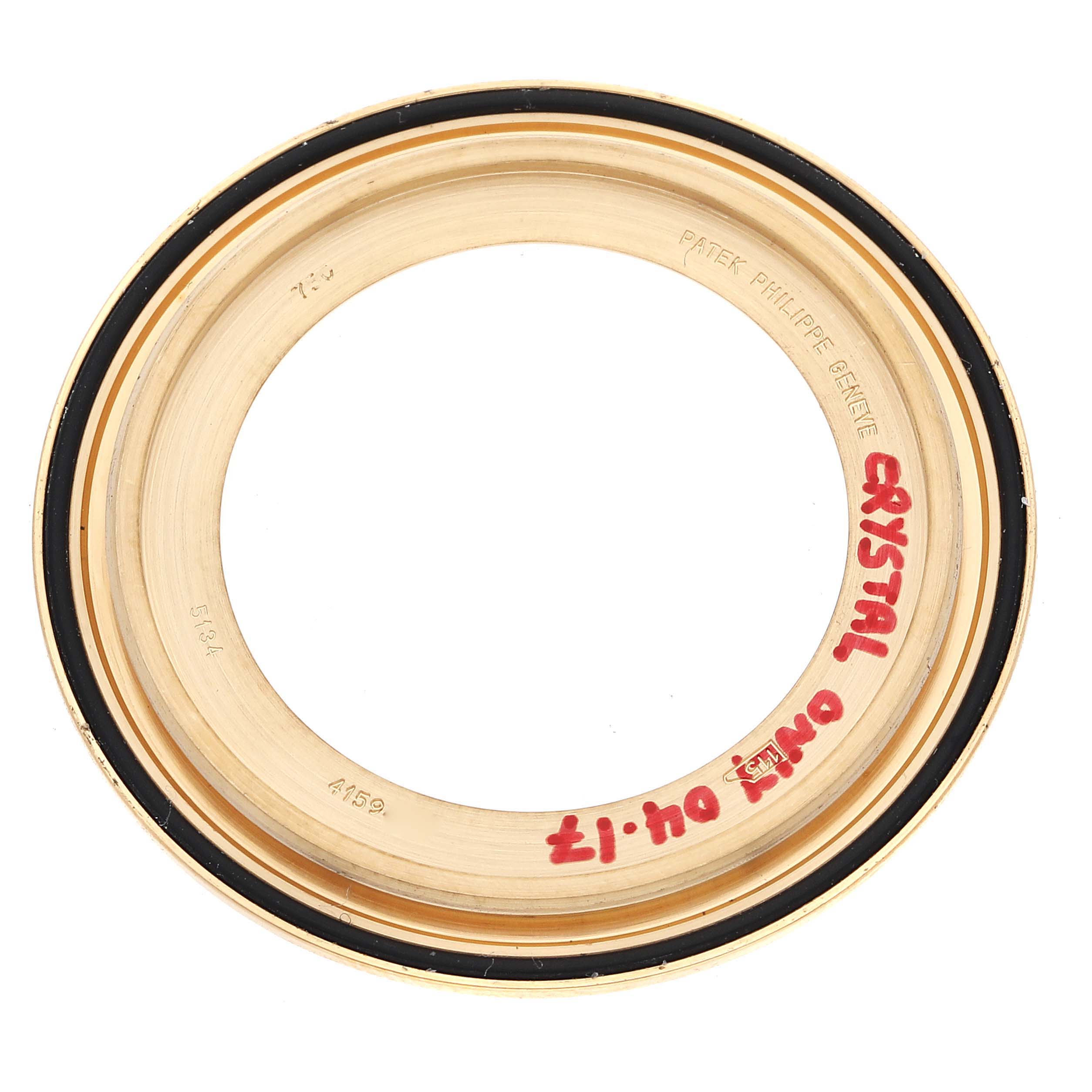 This image shows a top view of a gold bezel for a Patek Philippe Calatrava 5134J Men
s Yellow Gold White Dial 5134J Men
s Yellow Gold White Dial watch.