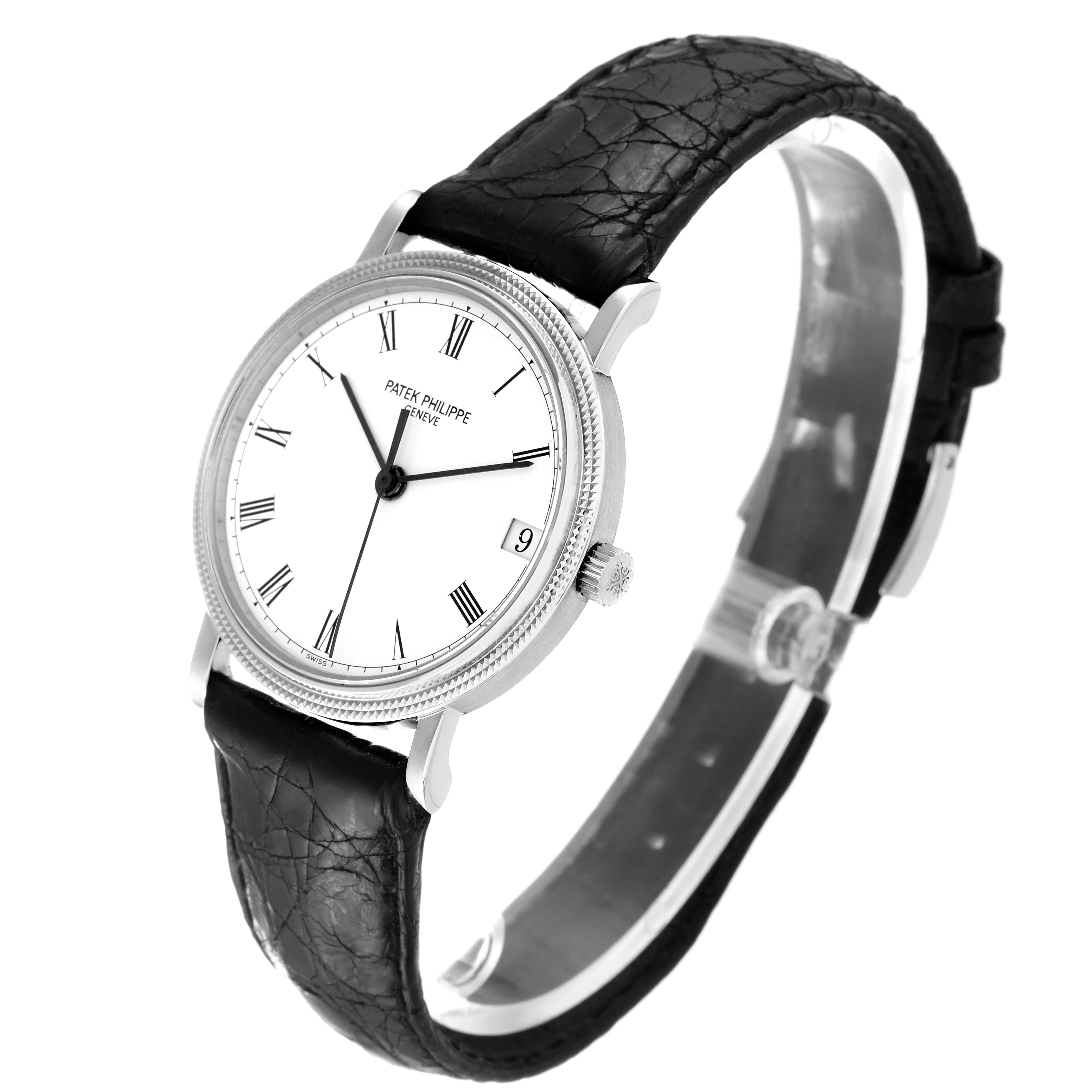 The image shows a Patek Philippe Calatrava 3802/200 Men
s White Gold White Dial 3802/200 Men
s White Gold White Dial watch at a slight angle, displaying the face, bezel, crown, and leather strap.