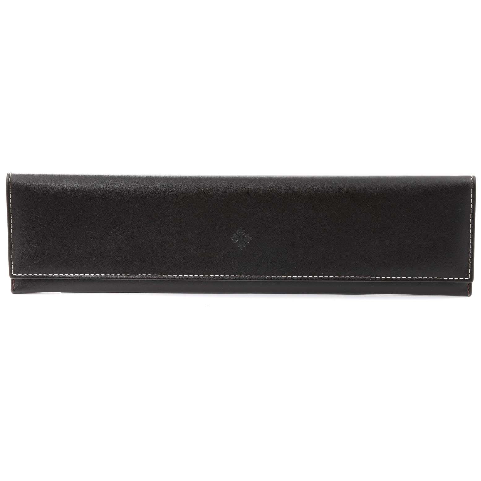 The image shows a Patek Philippe leather watch case for the Calatrava model, viewed from the front.