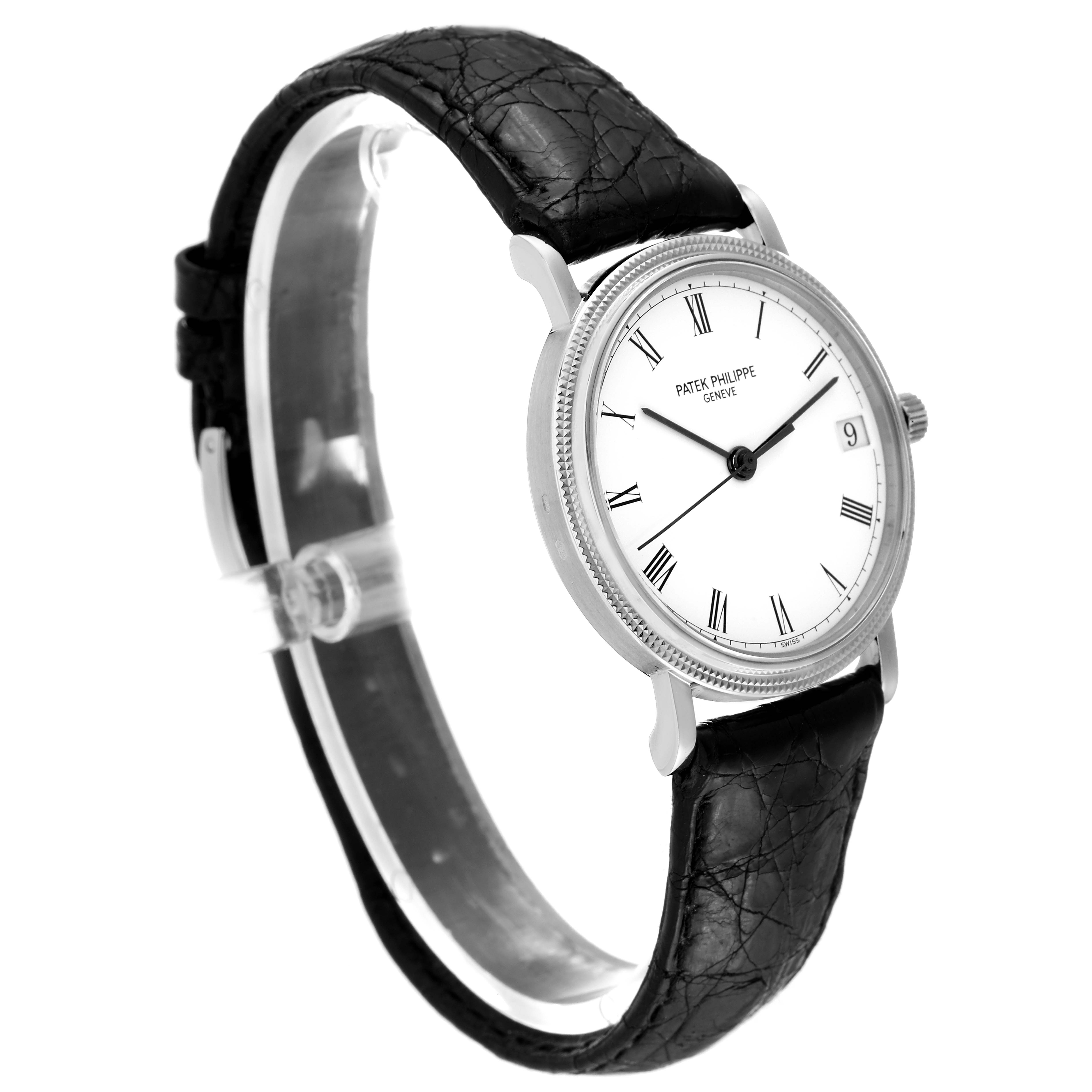 This image shows a side angle of a Patek Philippe Calatrava 3802/200 Men
s White Gold White Dial 3802/200 Men
s White Gold White Dial watch, highlighting its face, case, and leather strap.