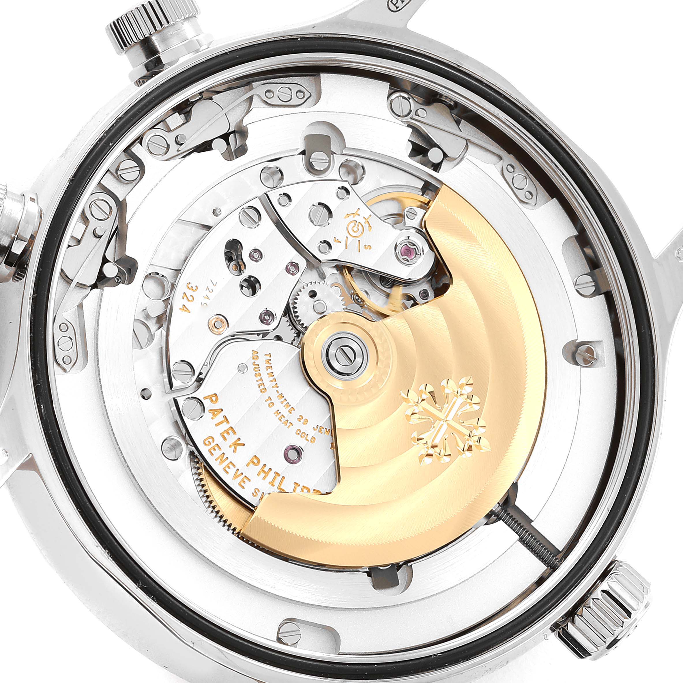 The image shows the back view of a Patek Philippe Calatrava 5524G-001 Men's White Gold Black Dial 5524G-001 Men's White Gold Black Dial watch, highlighting its mechanical movement components.