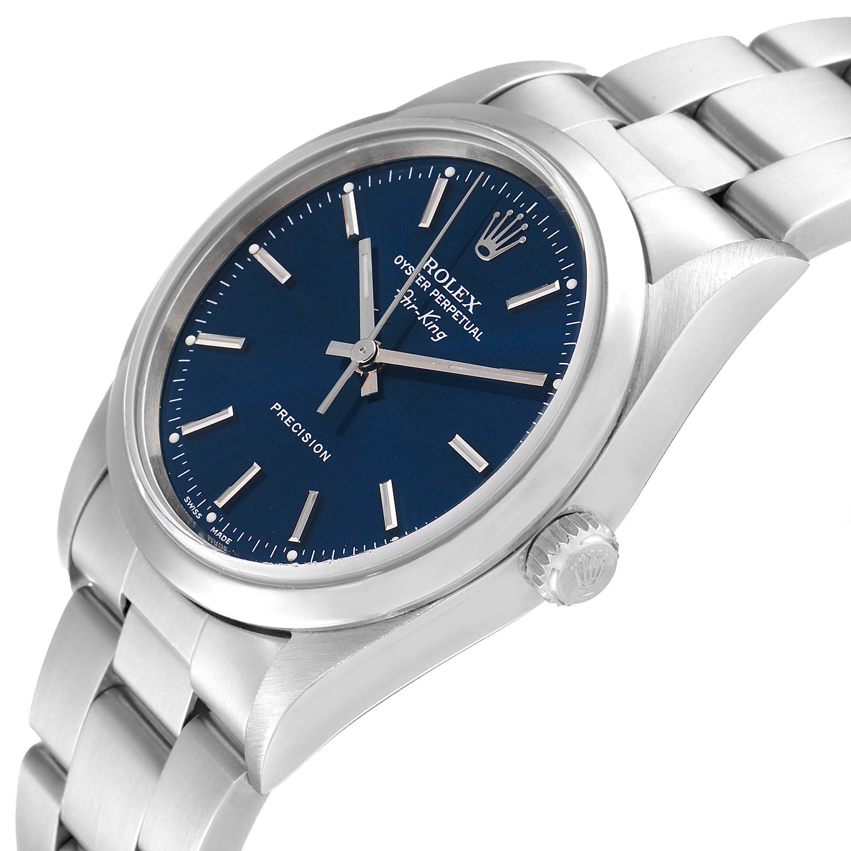 The Rolex Air-King 14000 Men's Stainless Steel Blue Dial 14000 Men's Stainless Steel Blue Dial watch is shown at an angled side view, displaying the blue dial, crown, and silver bracelet.
