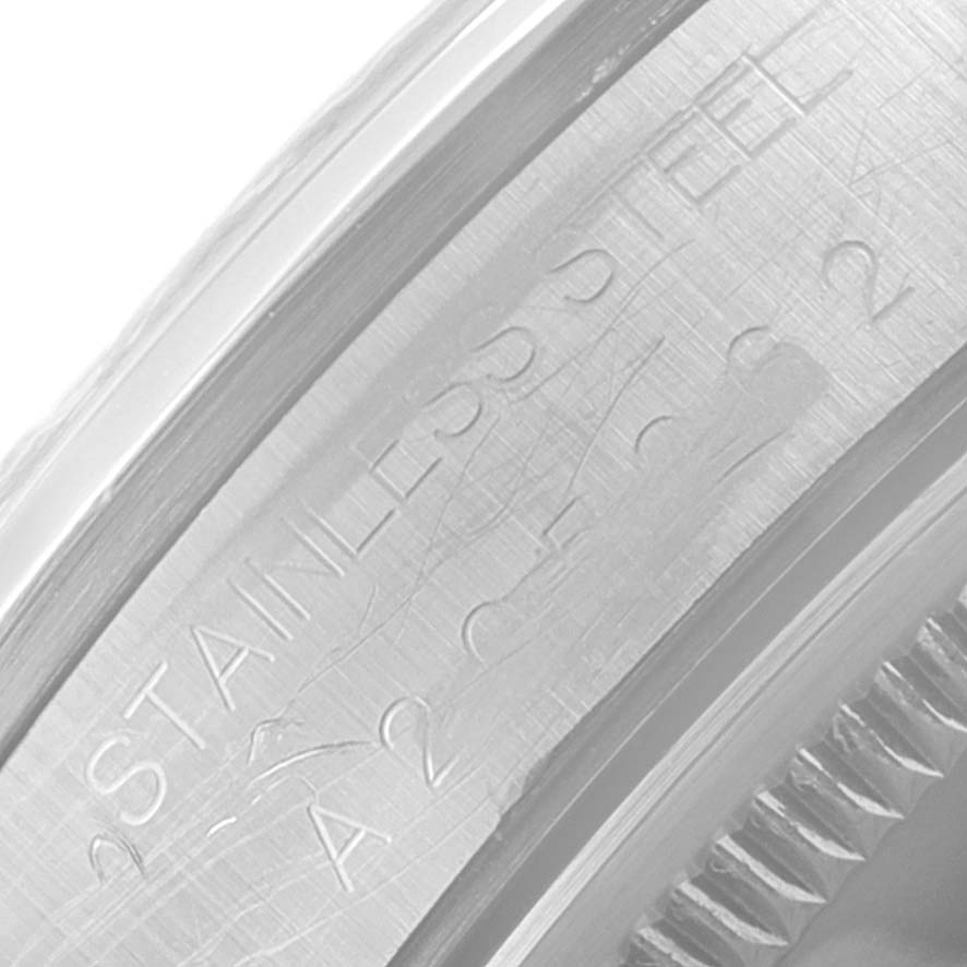 This close-up image shows the stainless steel and rehaut engraving of a Rolex Air-King 14000 Men's Stainless Steel Blue Dial 14000 Men's Stainless Steel Blue Dial watch.