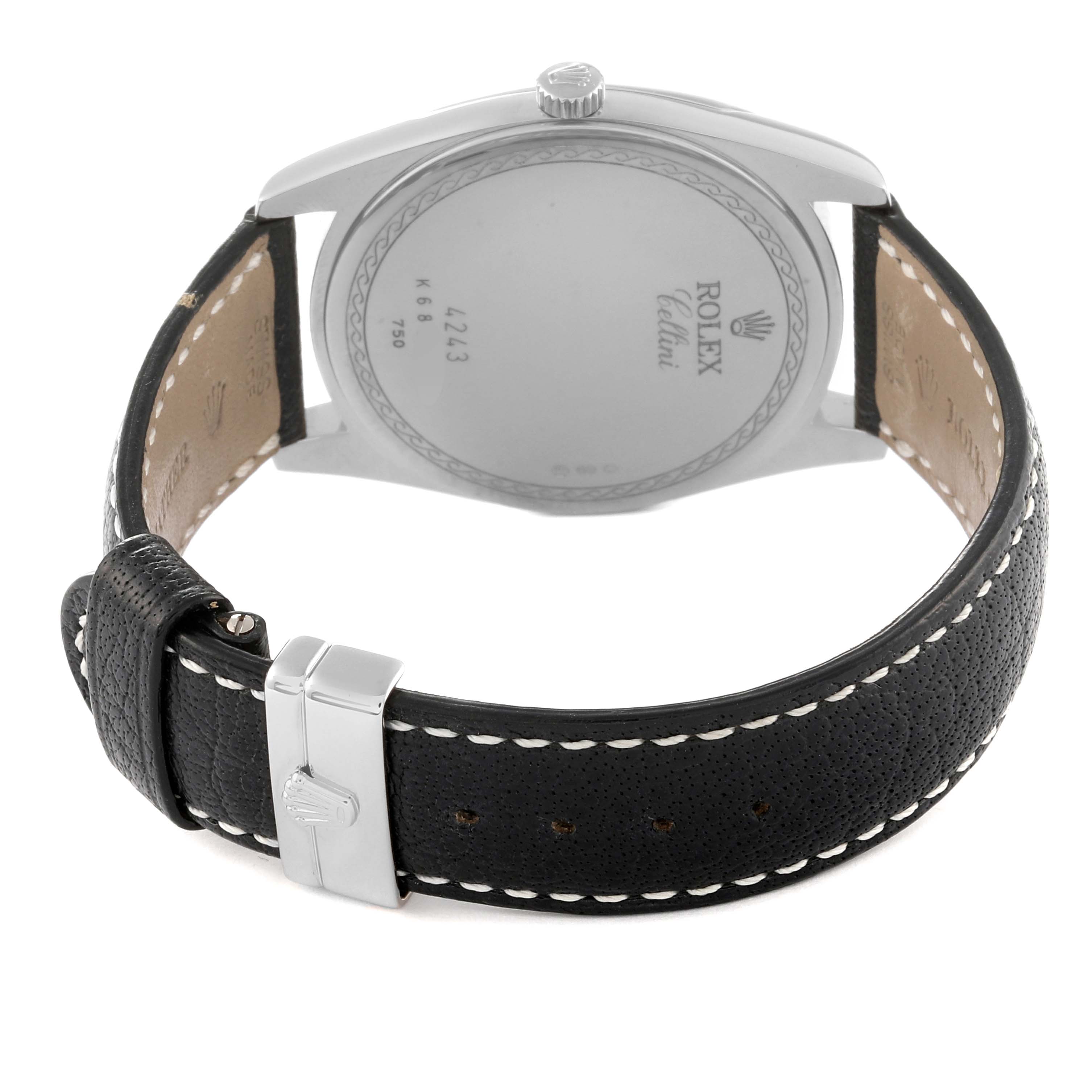 This image shows a rear view of a Rolex Cellini 4243 Men's White Gold Black Dial 4243 Men's White Gold Black Dial watch emphasizing the back case and leather strap with buckle.
