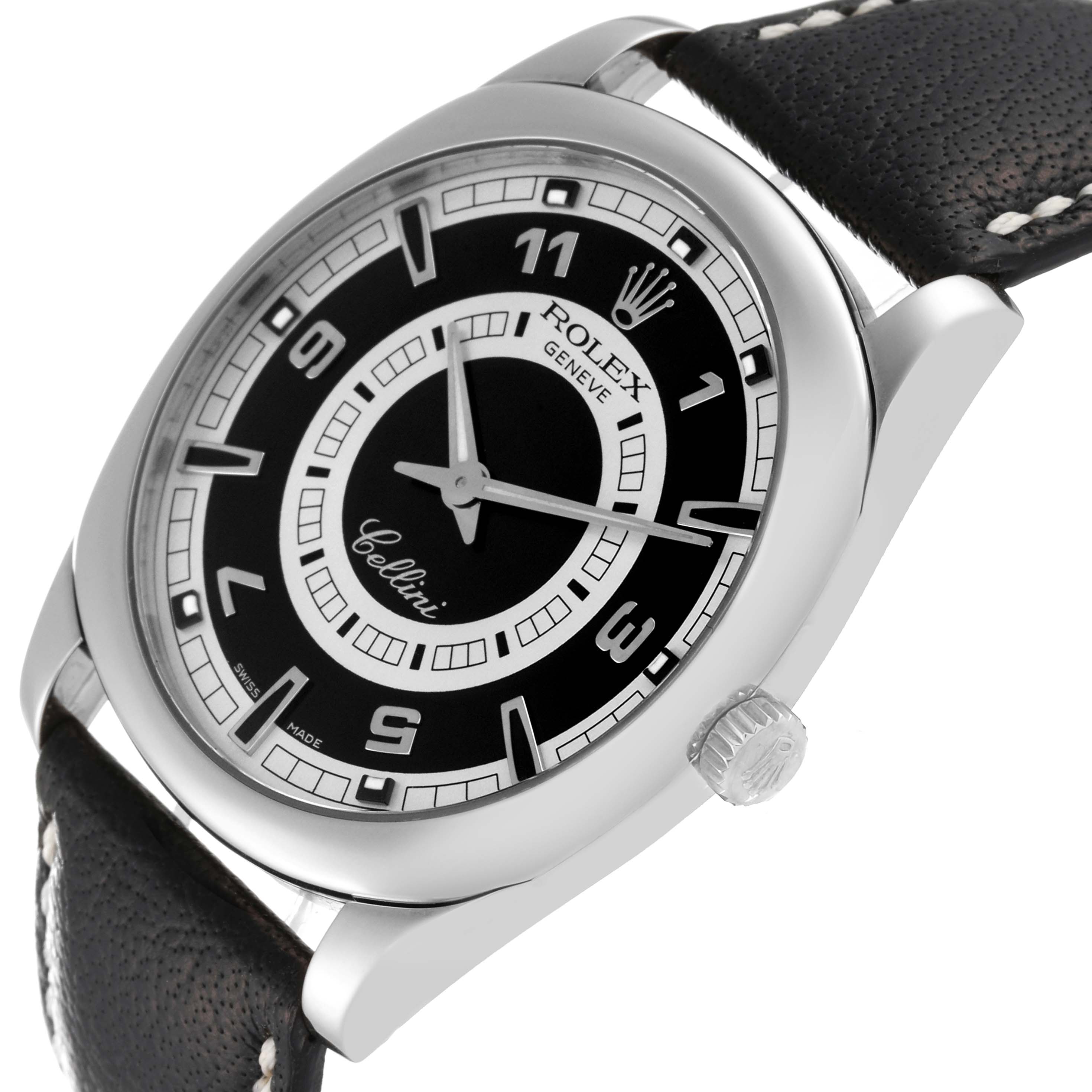 The Rolex Cellini 4243 Men's White Gold Black Dial 4243 Men's White Gold Black Dial watch is shown at a slight angle from the front, featuring its black dial, steel case, and crown, with a leather strap.