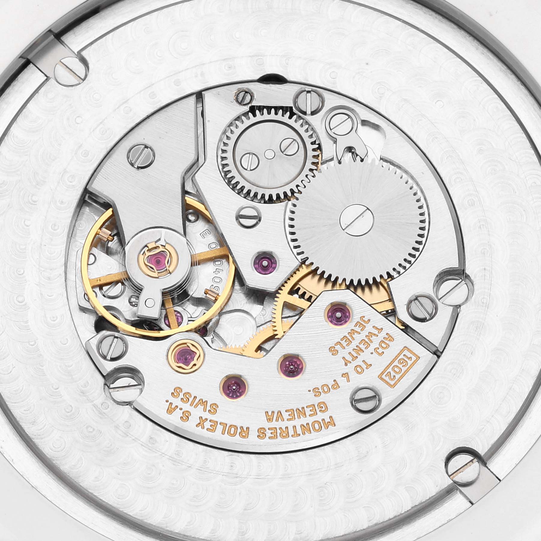 This is a close-up view of the internal mechanical movement of a Rolex Cellini 4243 Men's White Gold Black Dial 4243 Men's White Gold Black Dial watch, showcasing gears and other intricate components.