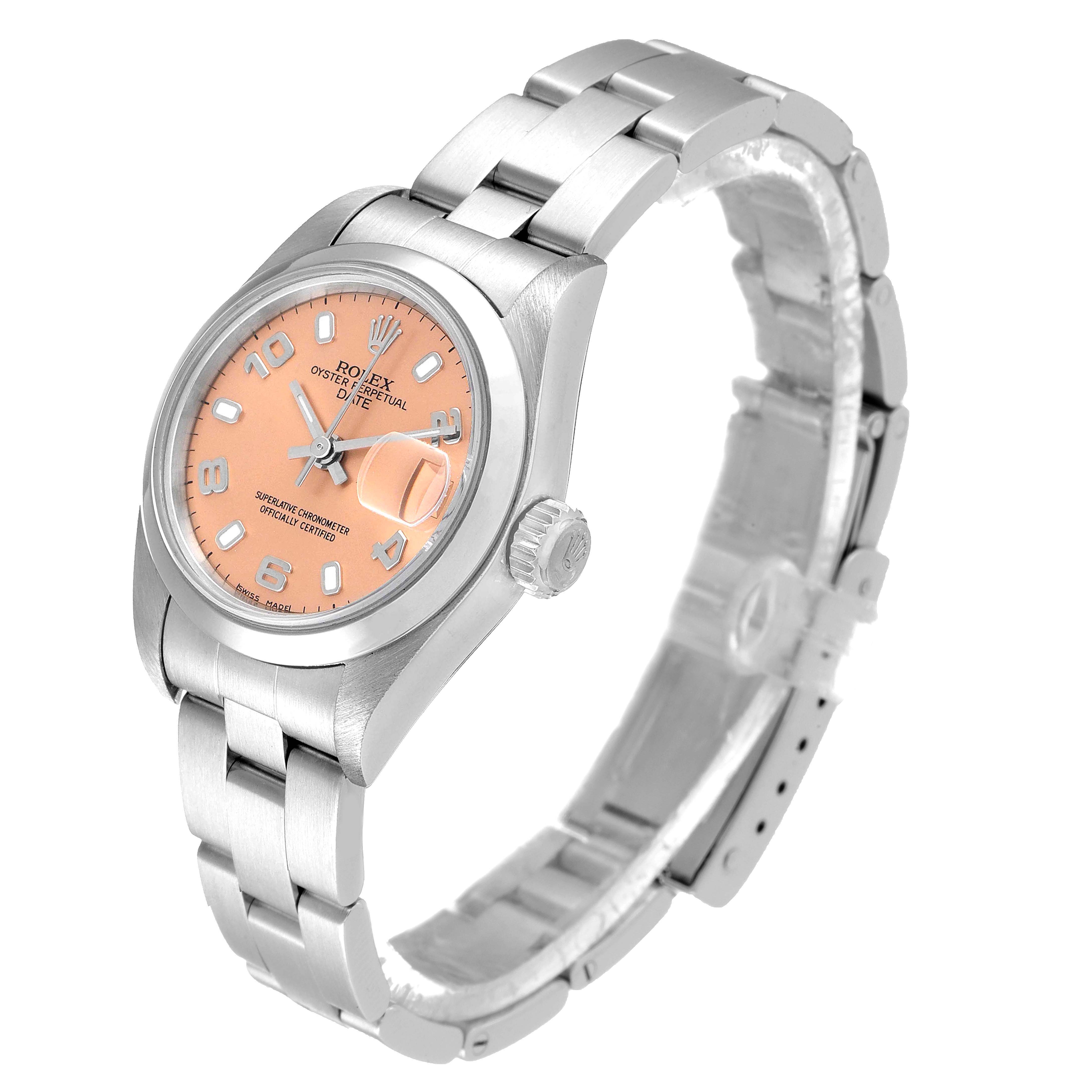 The image shows a side angle of a Rolex Date 79160 Women
s Stainless Steel Pink Dial 79160 Women
s Stainless Steel Pink Dial model watch, highlighting its dial, crown, case, and bracelet.