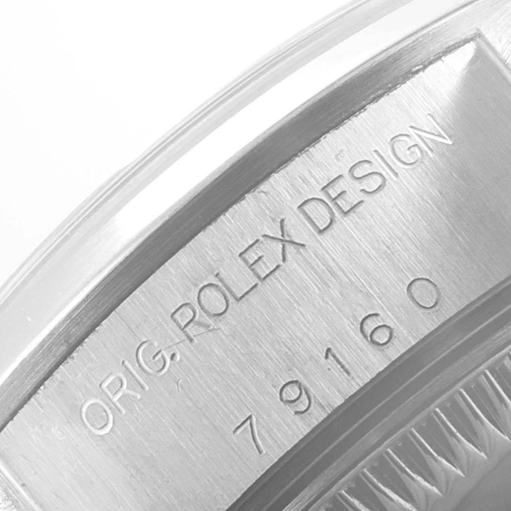 This image shows a close-up of the case detailing, including the model number of a Rolex Date 79160 Women
s Stainless Steel Pink Dial 79160 Women
s Stainless Steel Pink Dial watch.