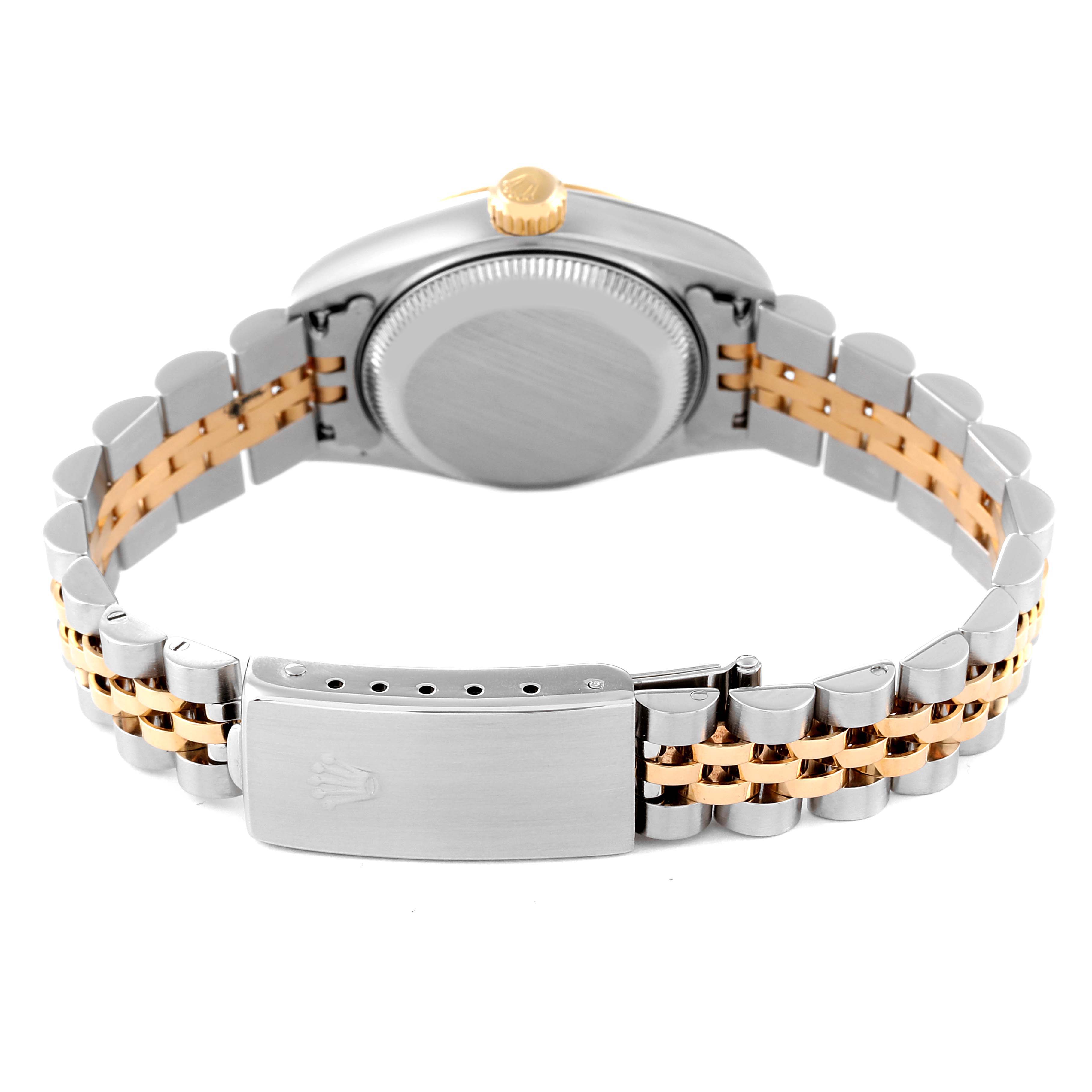 This image shows the back case and bracelet of a Rolex Datejust 79173 Women's Steel and Gold (two tone) White Dial 79173 Women's Steel and Gold (two tone) White Dial watch, featuring a two-tone metal design.