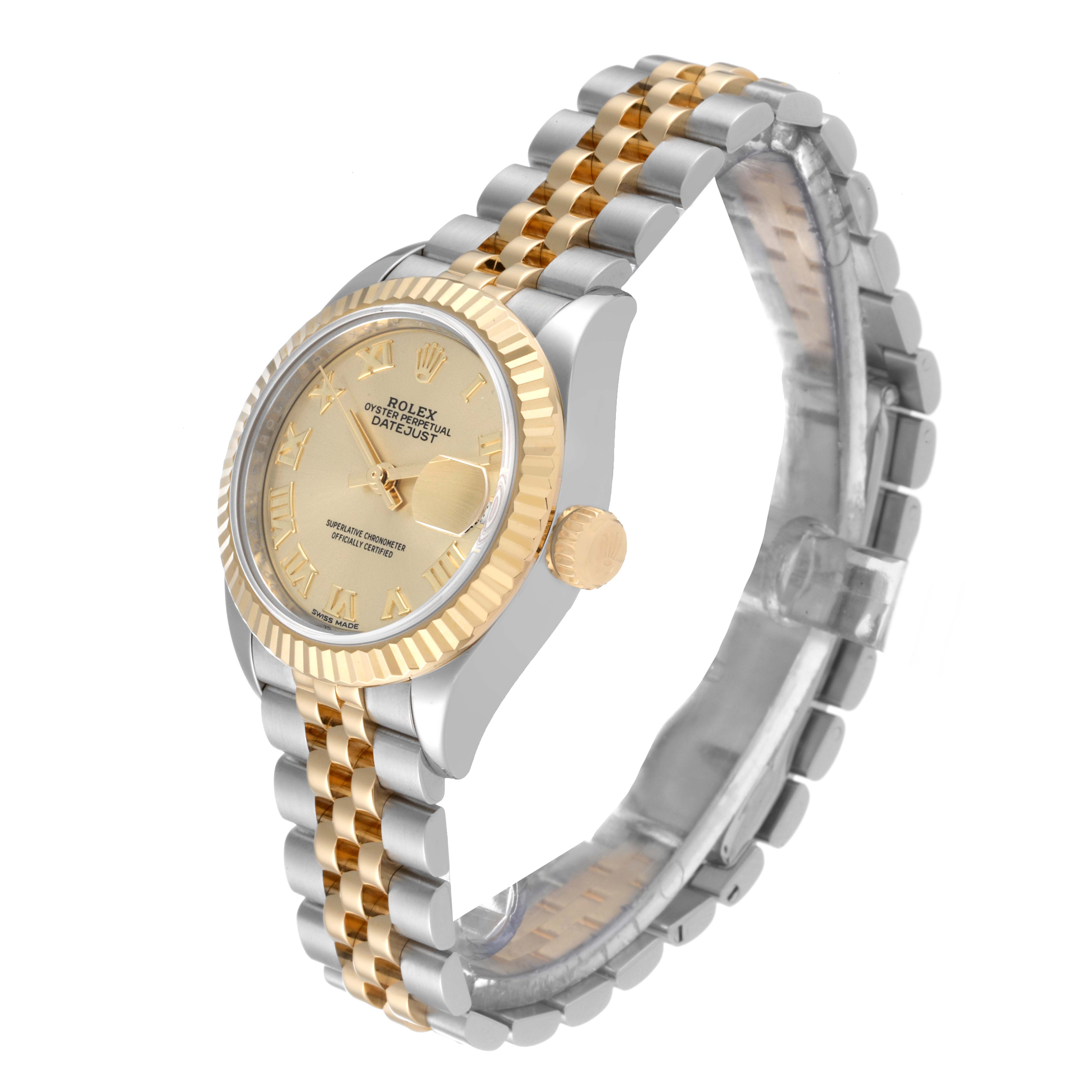 The Rolex Datejust 279173 Women's Steel and Gold (two tone) Champagne Dial 279173 Women's Steel and Gold (two tone) Champagne Dial watch is shown at a slight angle, displaying its face, bezel, crown, and two-tone metal bracelet.