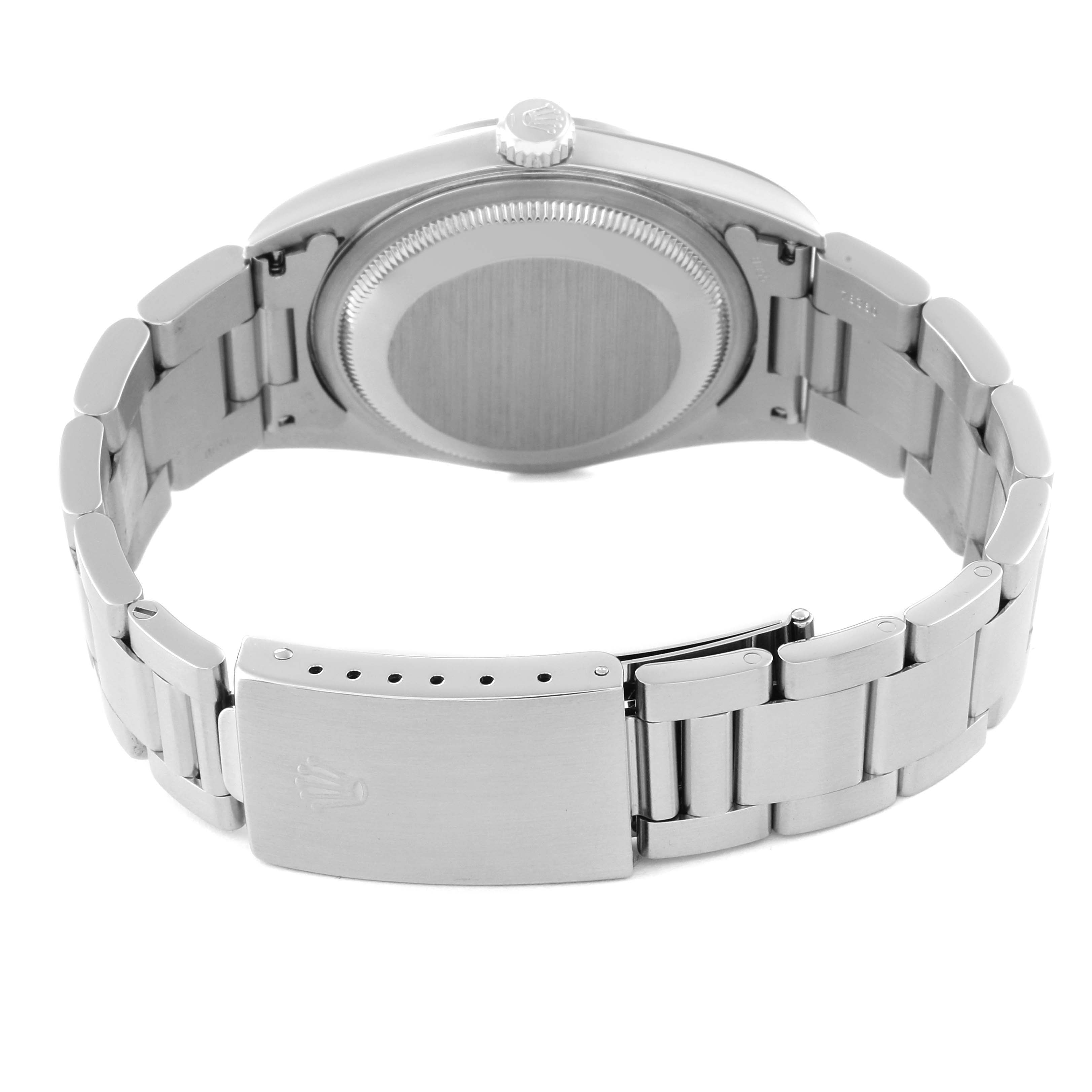 This image shows the back view of a Rolex Datejust 16200 Men's Stainless Steel Silver Dial 16200 Men's Stainless Steel Silver Dial watch, highlighting the clasp, bracelet, and case back.