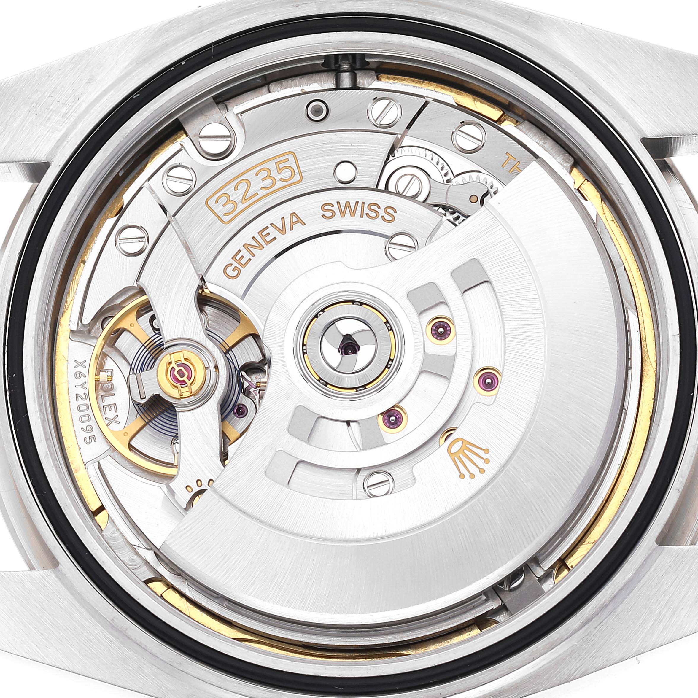 The image shows a close-up view of the movement and inner workings of a Rolex Datejust 41 126334 Men's Stainless Steel Blue Dial 126334 Men's Stainless Steel Blue Dial watch.