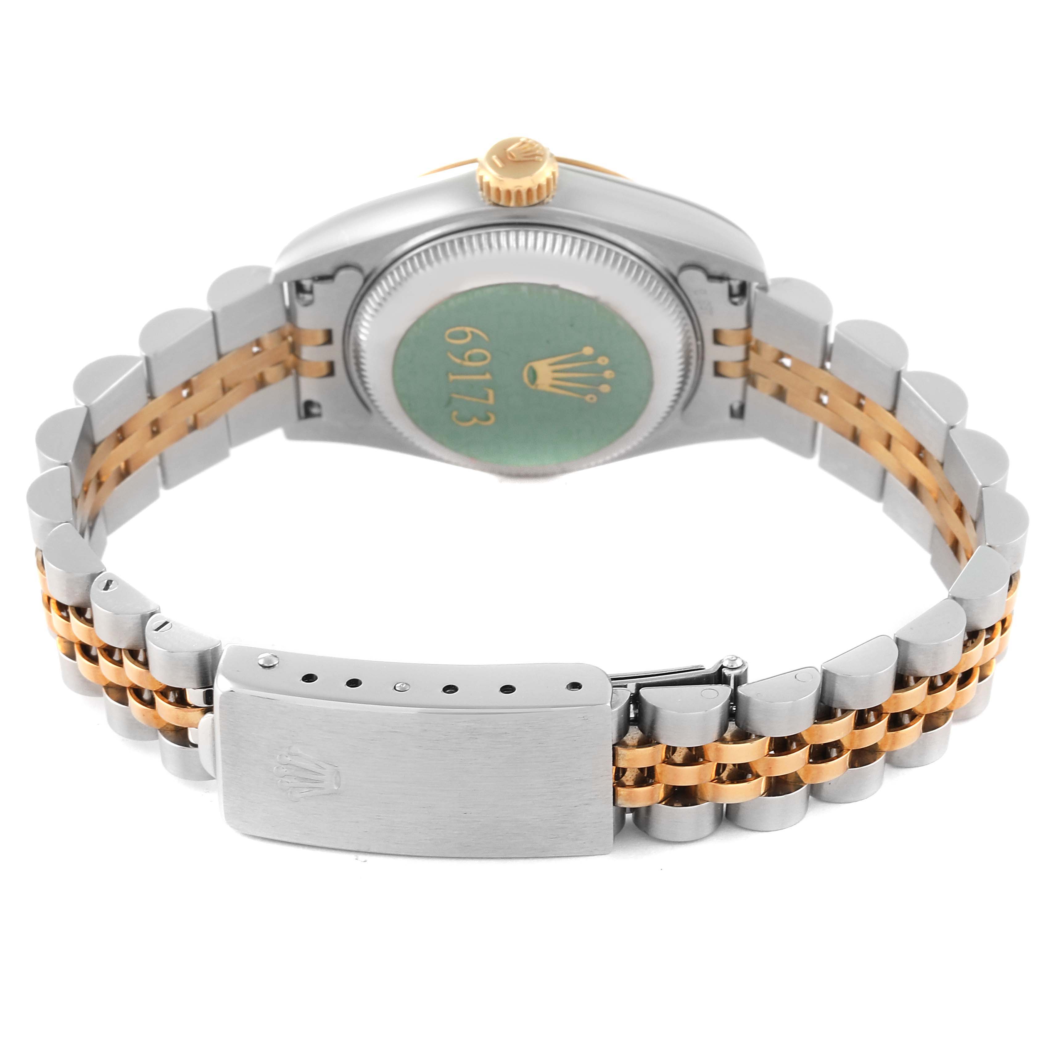 The image shows the back view of a Rolex Datejust 69173 Women's Steel and Gold (two tone) Champagne Dial 69173 Women's Steel and Gold (two tone) Champagne Dial watch, highlighting the case back, crown, and two-tone bracelet with a clasp.