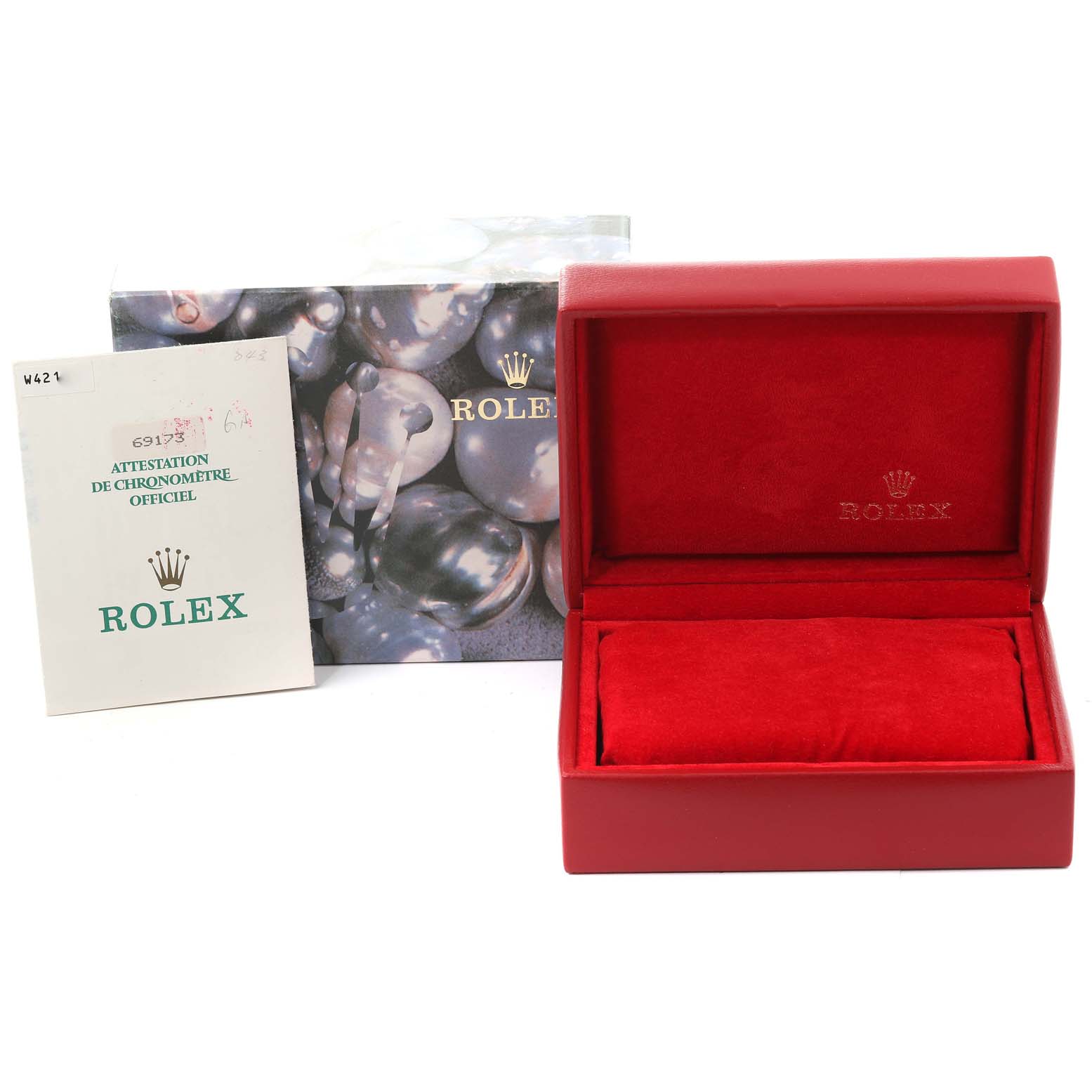 The image shows the open packaging and warranty card for a Rolex Datejust 69173 Women's Steel and Gold (two tone) Champagne Dial 69173 Women's Steel and Gold (two tone) Champagne Dial watch.