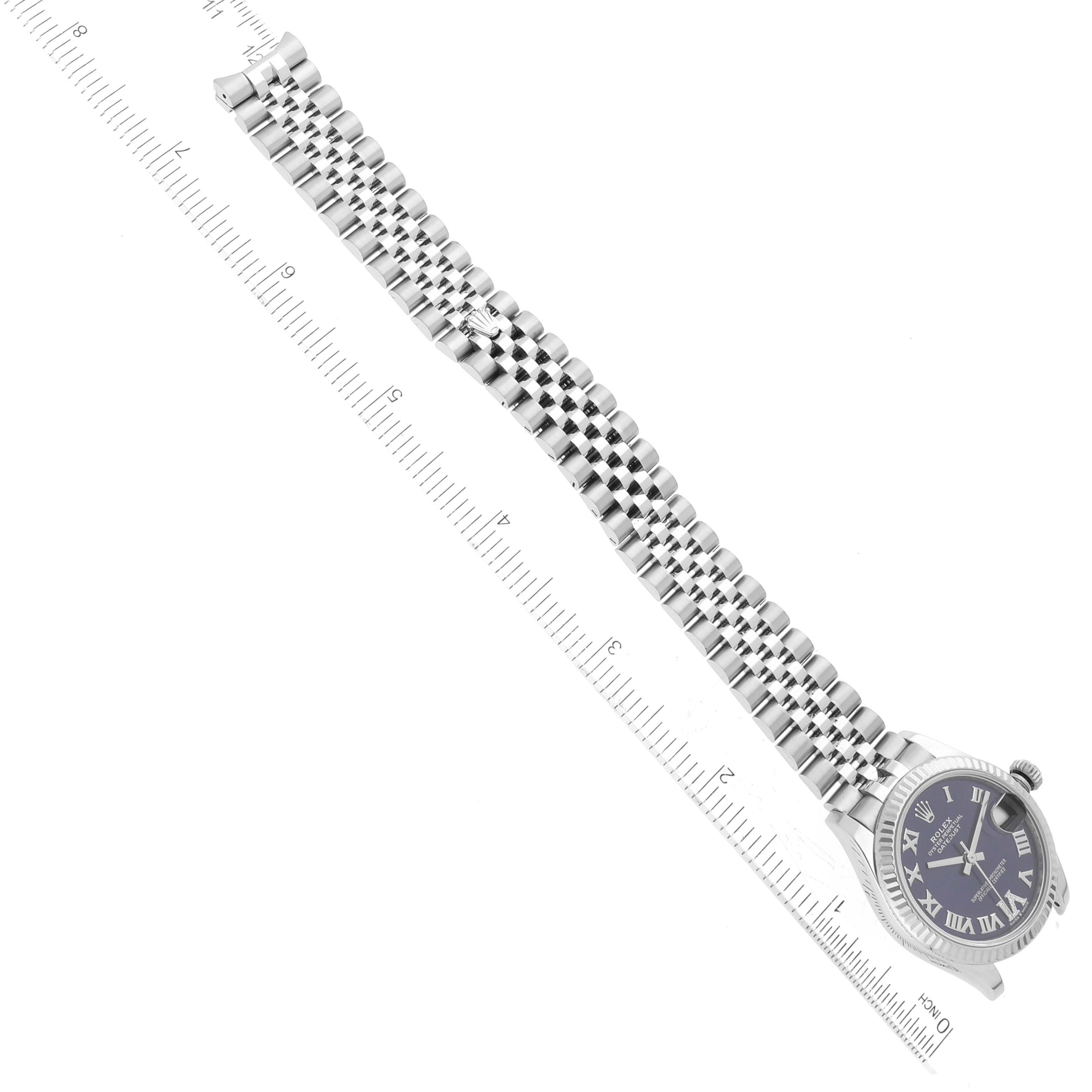 This image showcases a Rolex Mid-Size 278274 Women's Stainless Steel Purple Dial 278274 Women's Stainless Steel Purple Dial watch seen from above, featuring a blue dial, Roman numeral markers, and a stainless steel bracelet.