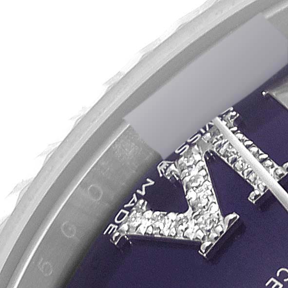 This image shows a close-up angle of the dial and bezel of a Rolex Mid-Size 278274 Women's Stainless Steel Purple Dial 278274 Women's Stainless Steel Purple Dial model watch.