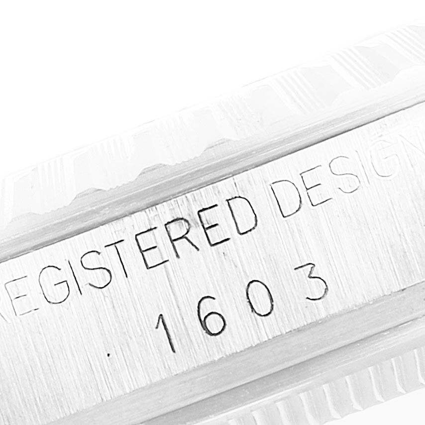 This image shows a close-up of the case side with the model number of a Rolex Vintage Collection 1603 Men's Stainless Steel Silver Dial 1603 Men's Stainless Steel Silver Dial watch.